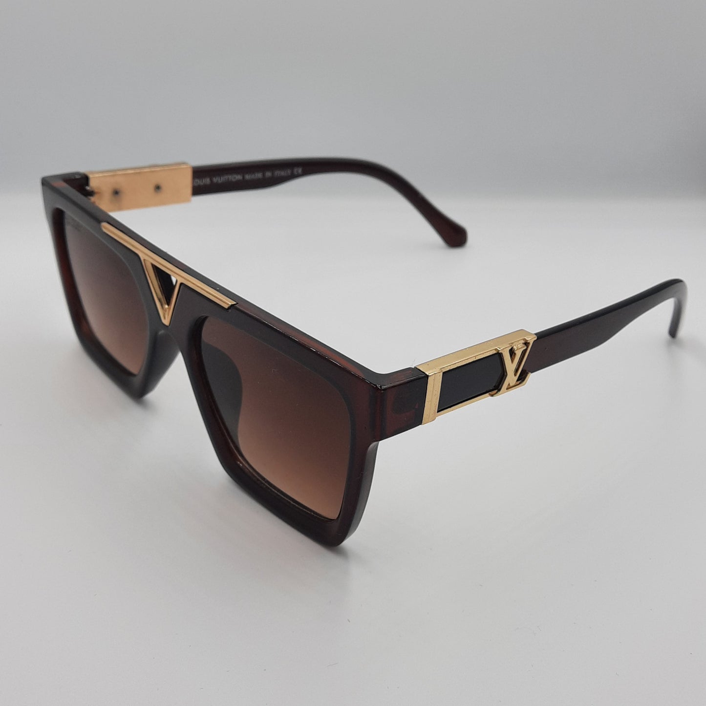 Solaires: LOUIS VUITTON 2105 marron/gold