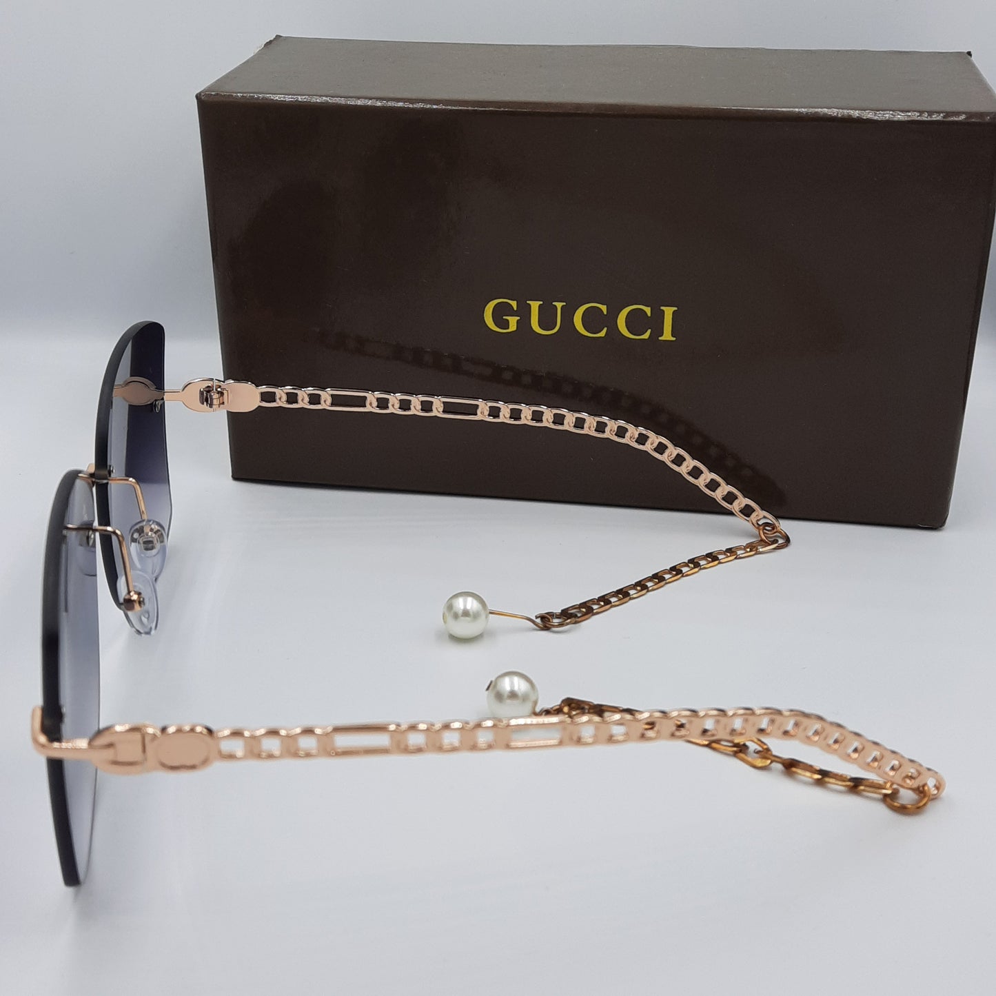 Solaires: GUCCI GRIS/NOIR gold