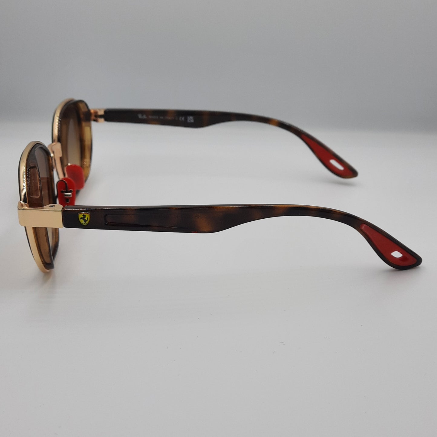 Lunette soleil ferrari maroc sport scuderia casa marrakech doré rouge marron