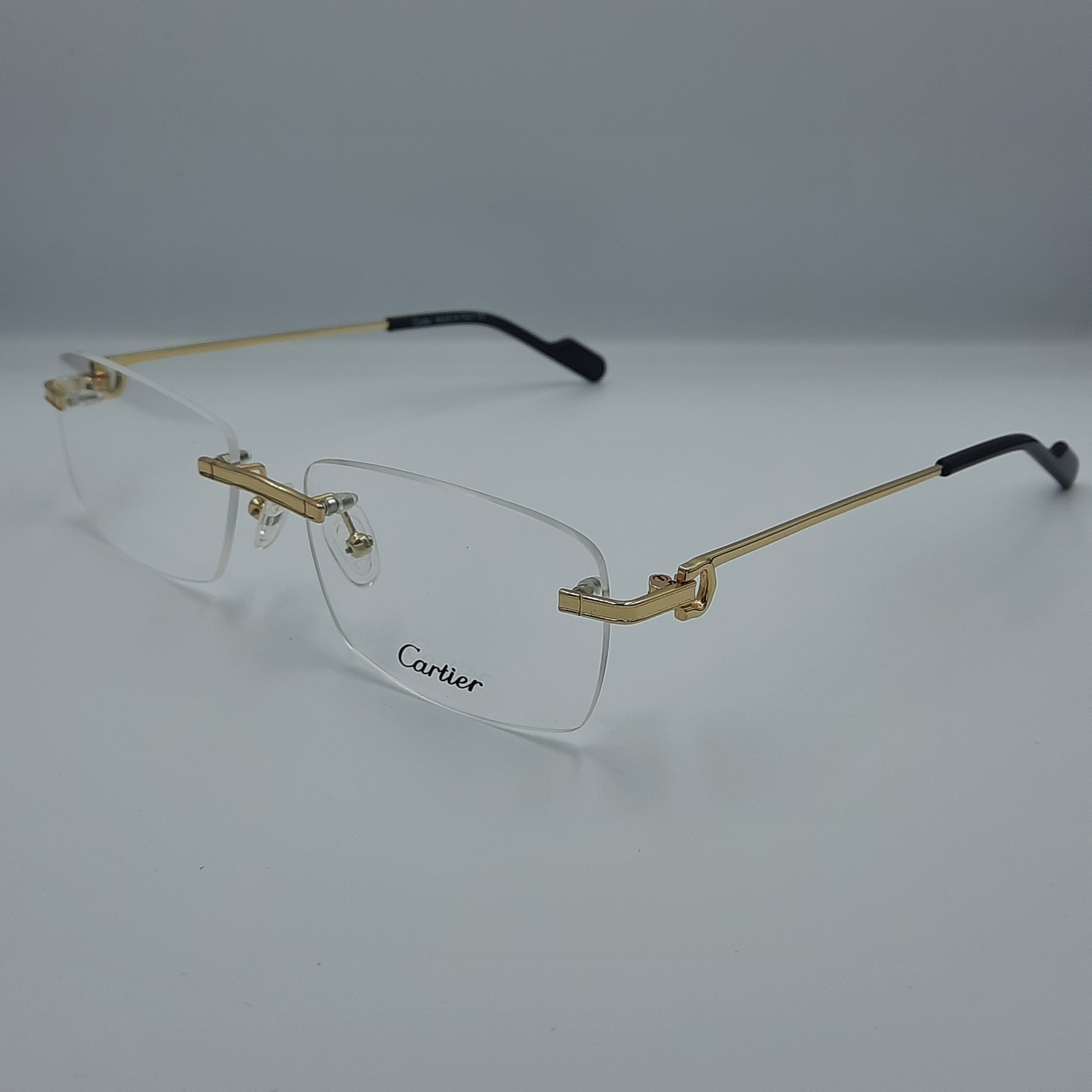 Lunette optique percee Cartier dore noir