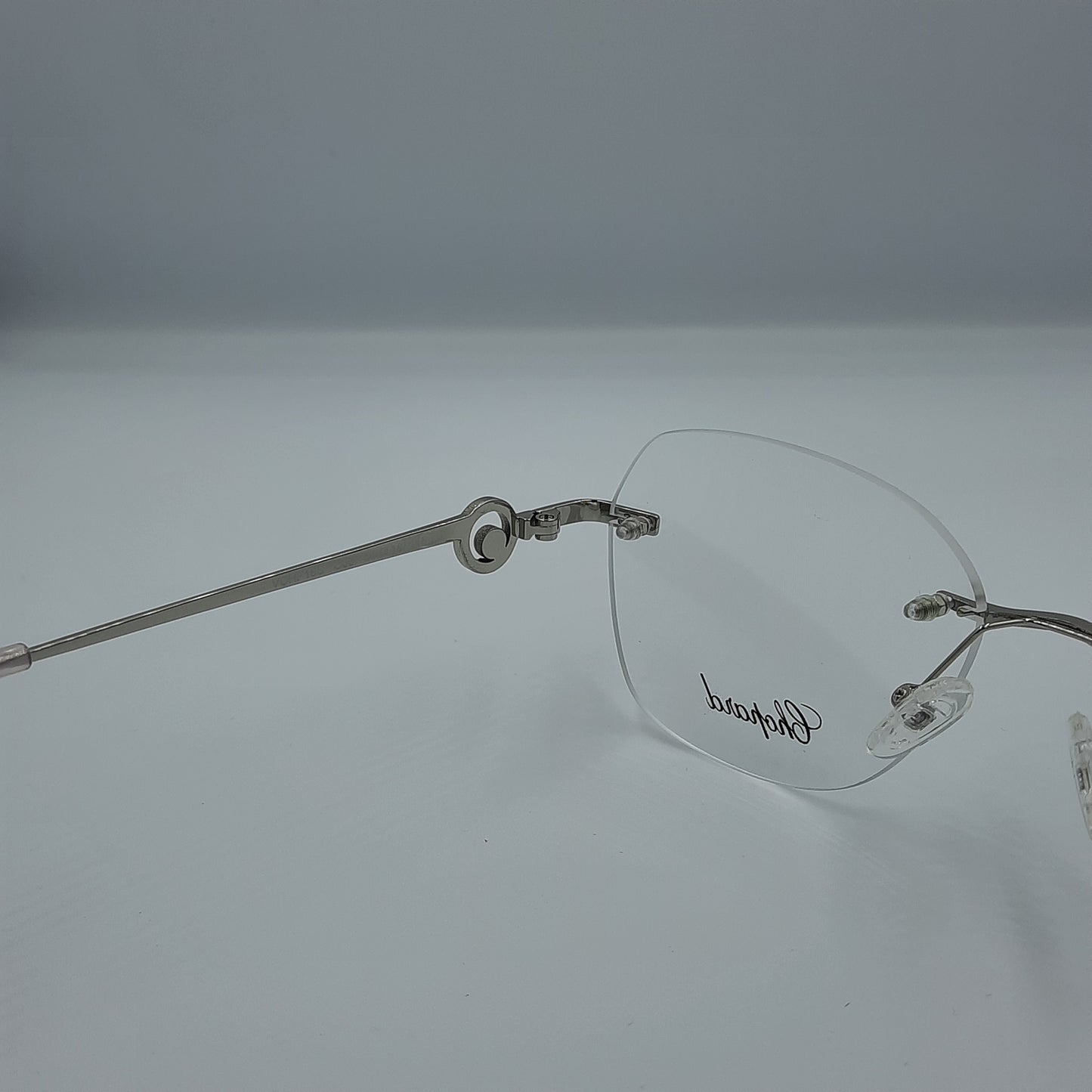 Lunette optique percée Chopard : argent rose