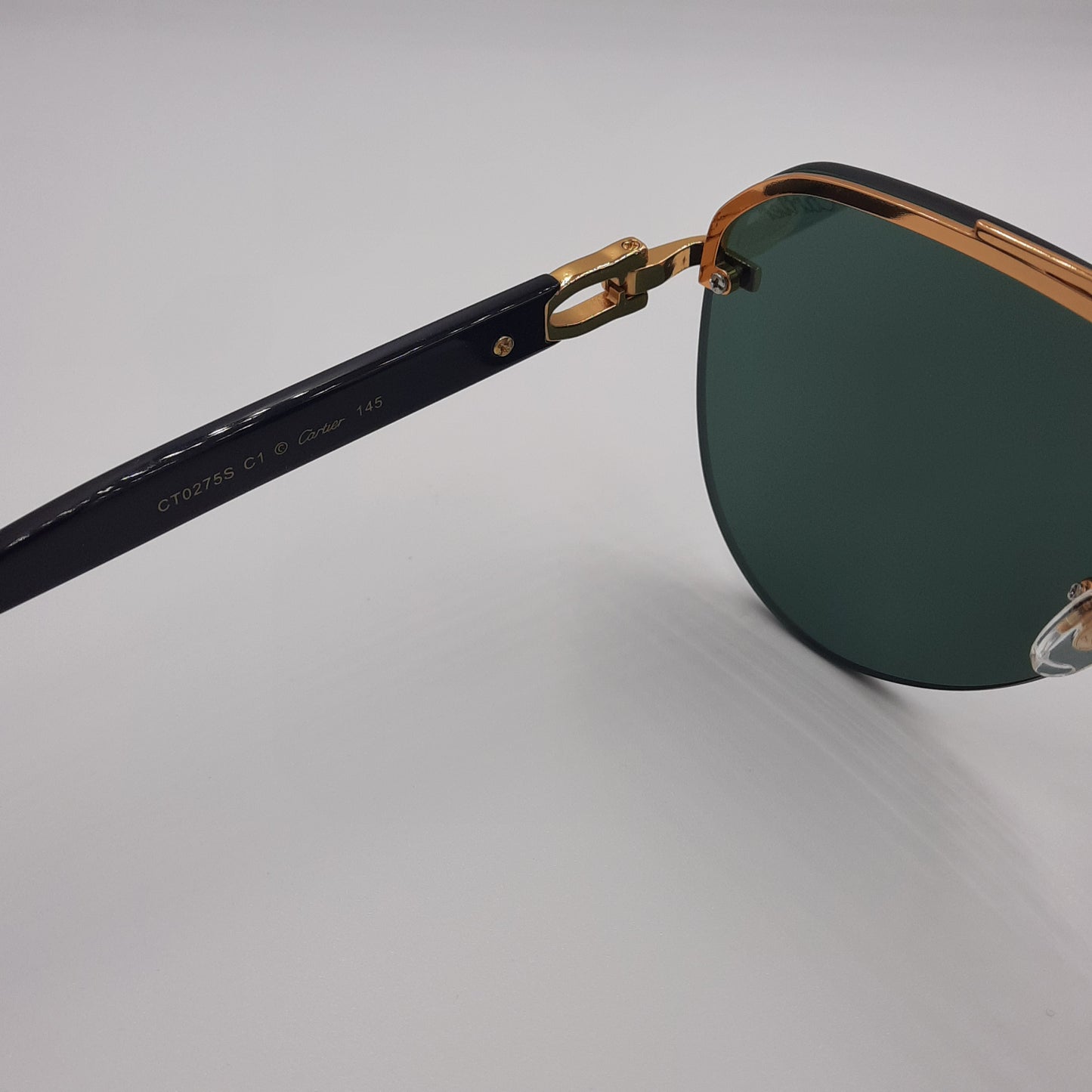 Solaires: CARTIER CT0275S noir vert doré