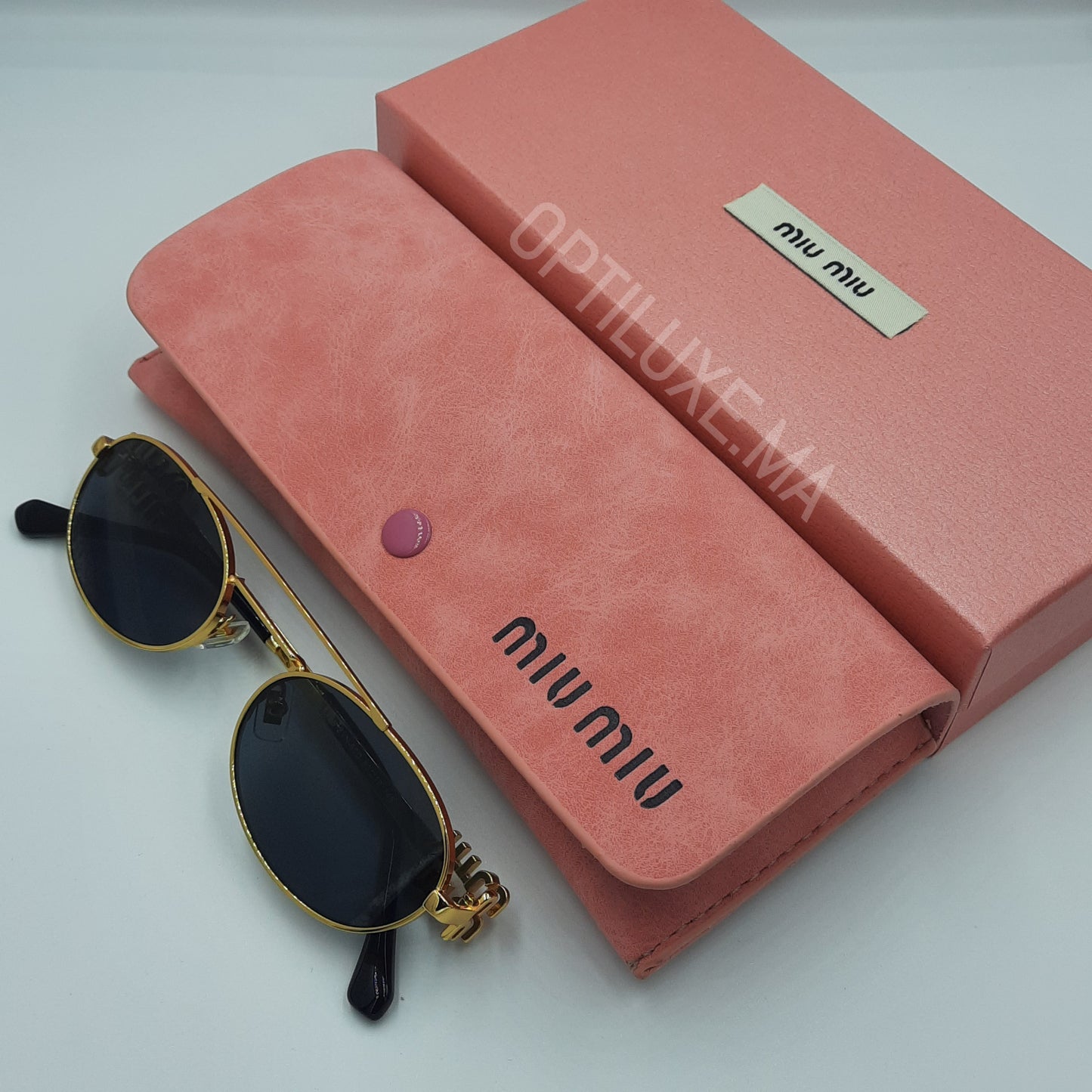 Solaires: MIUMIU SMU54ZS Noir/GOLD