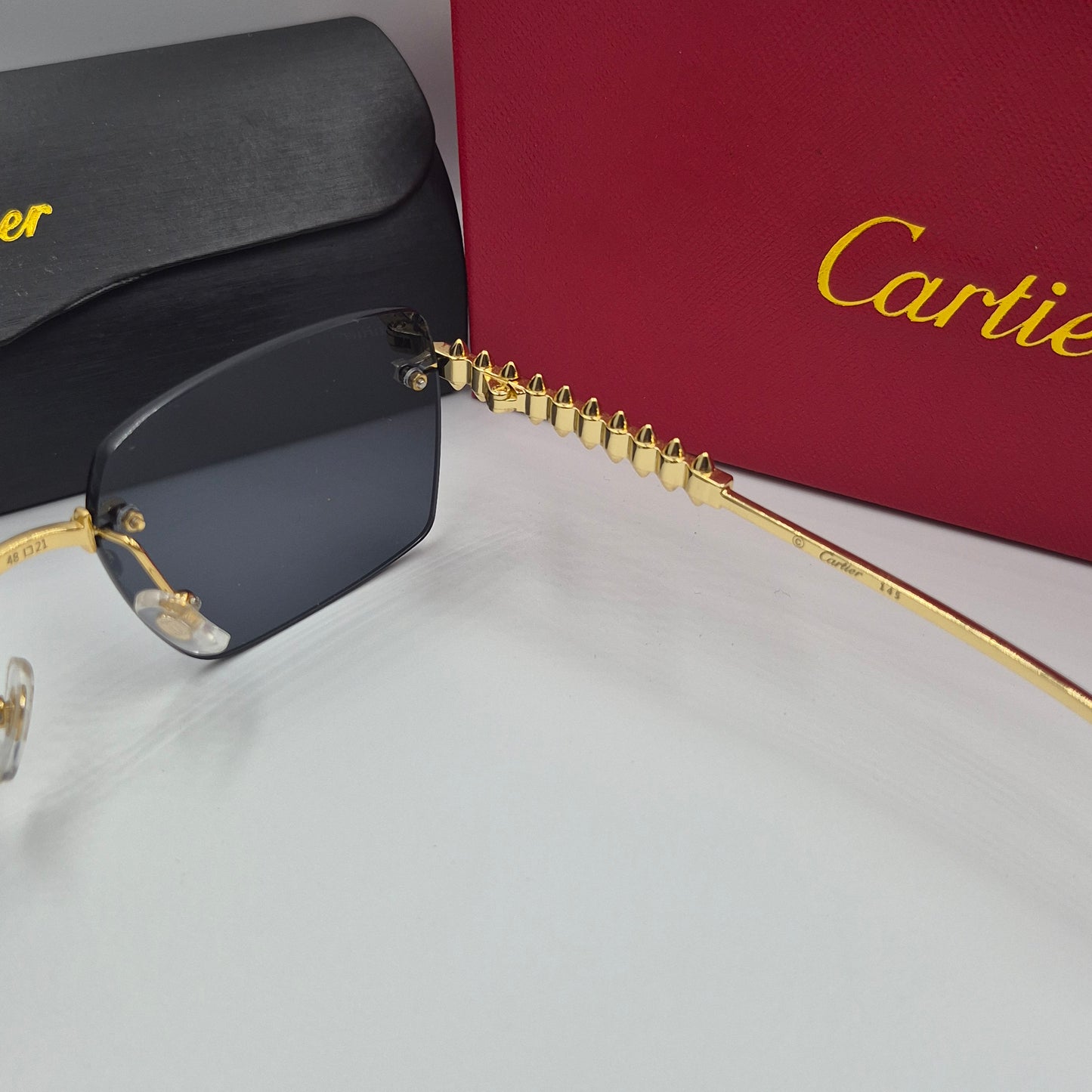 Solaires: CARTIER CLASH CT0545S doré noir