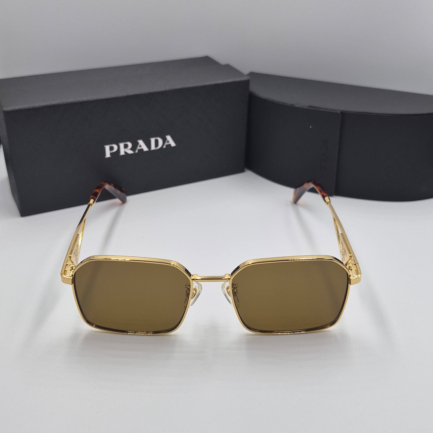 Solaires: PRADA PRA51V doré marron havane