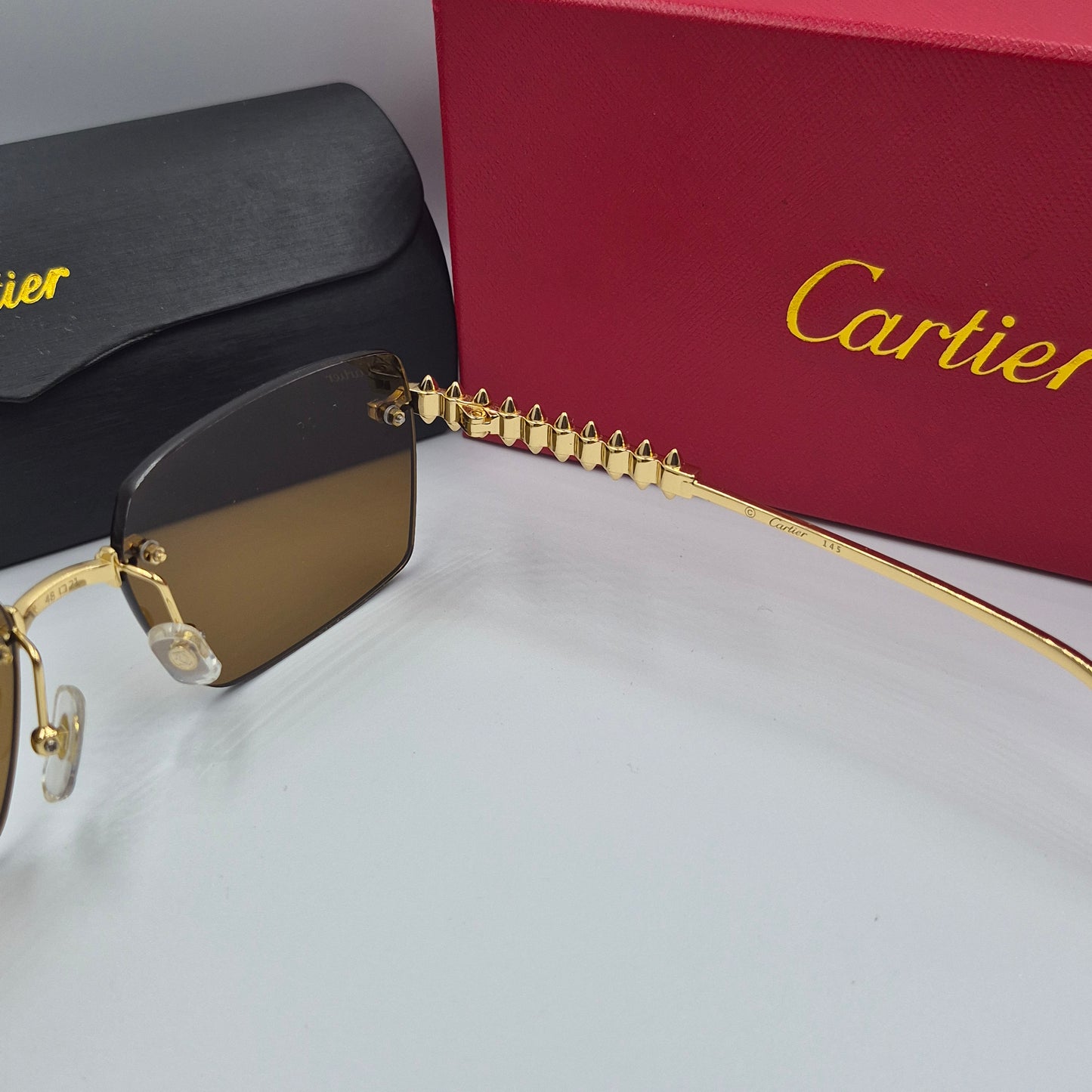 Solaires: CARTIER CLASH CT0545S doré marron