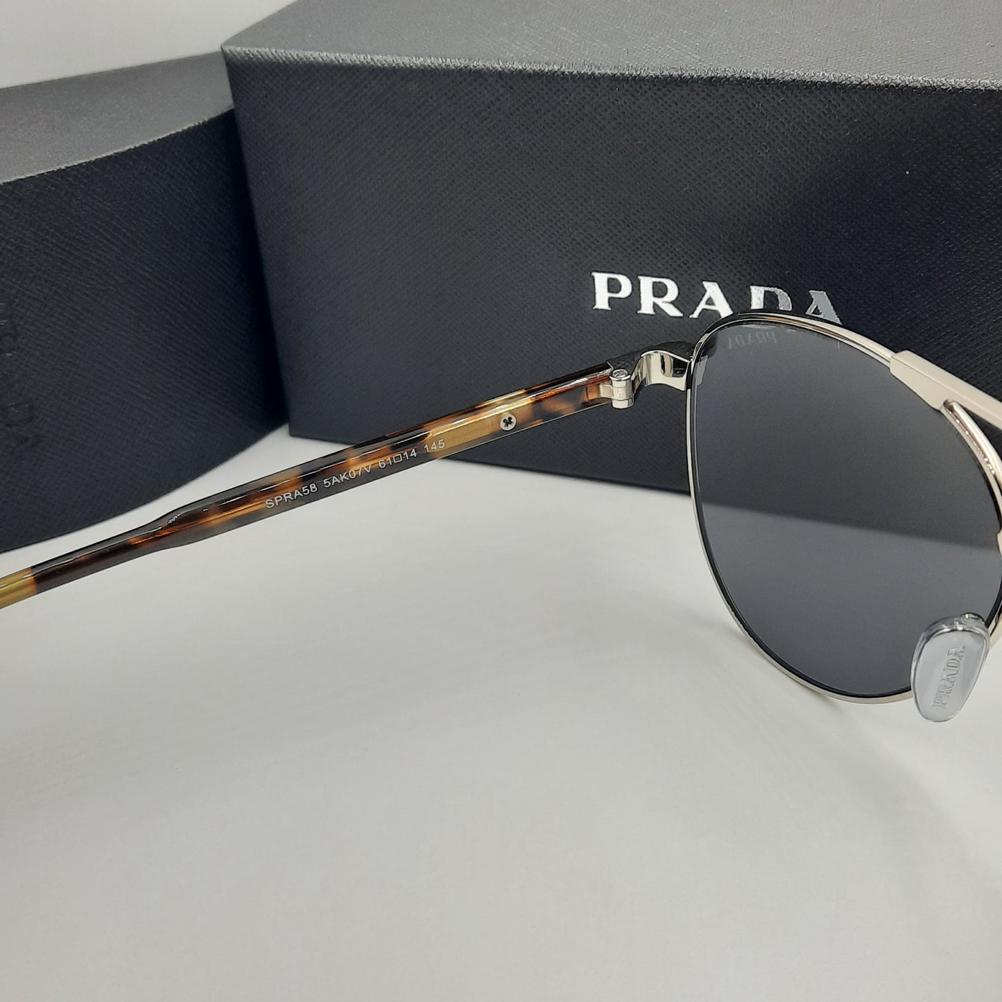 Solaires: PRADA SPRA58 argent tortoise