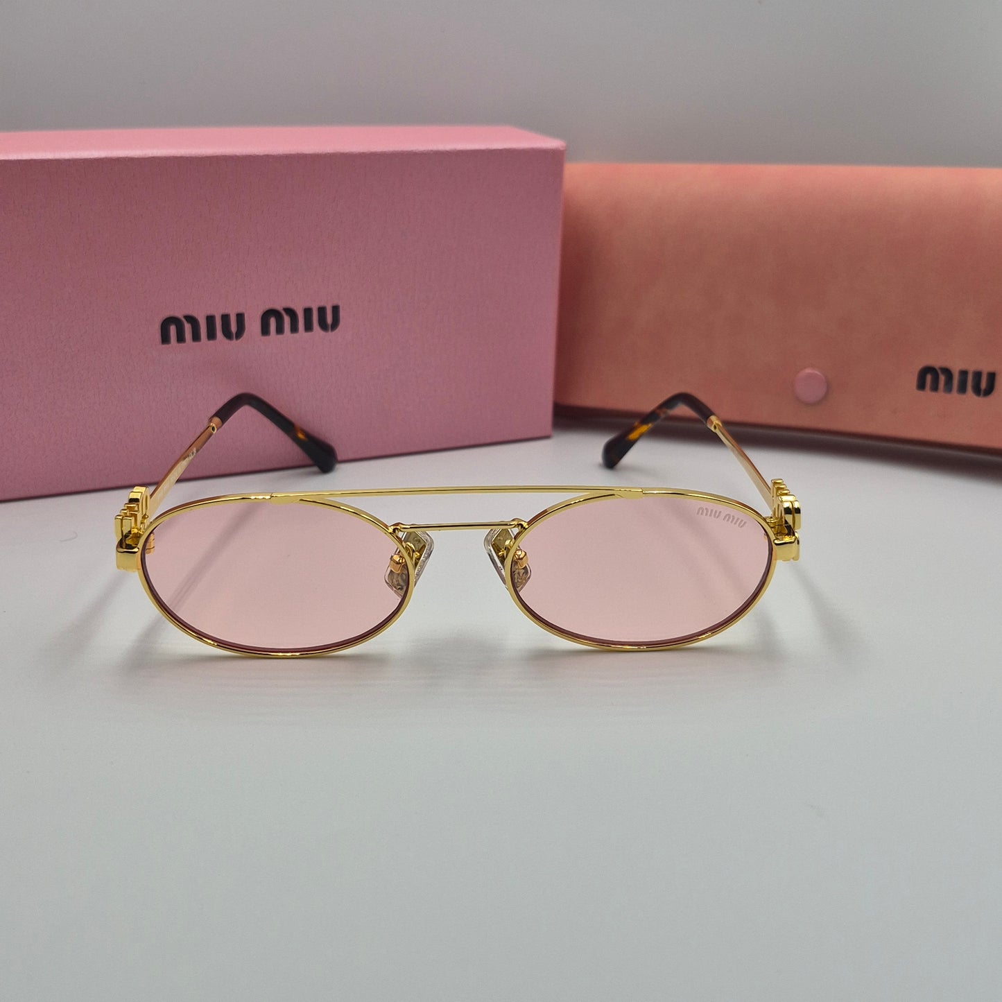 Solaires: MIUMIU SMU54ZS doré rose saumon