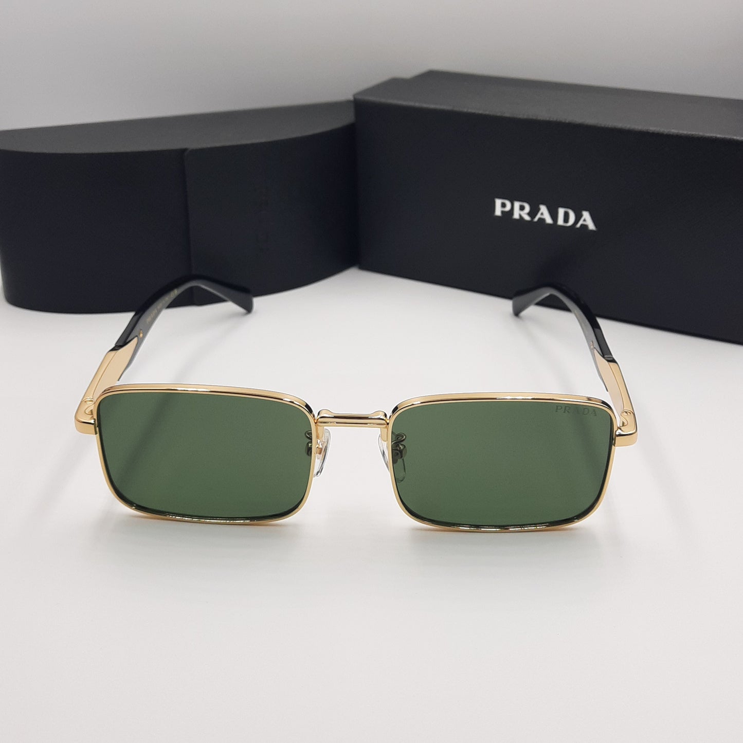 Solaires: PRADA PR69ZS doré noir vert