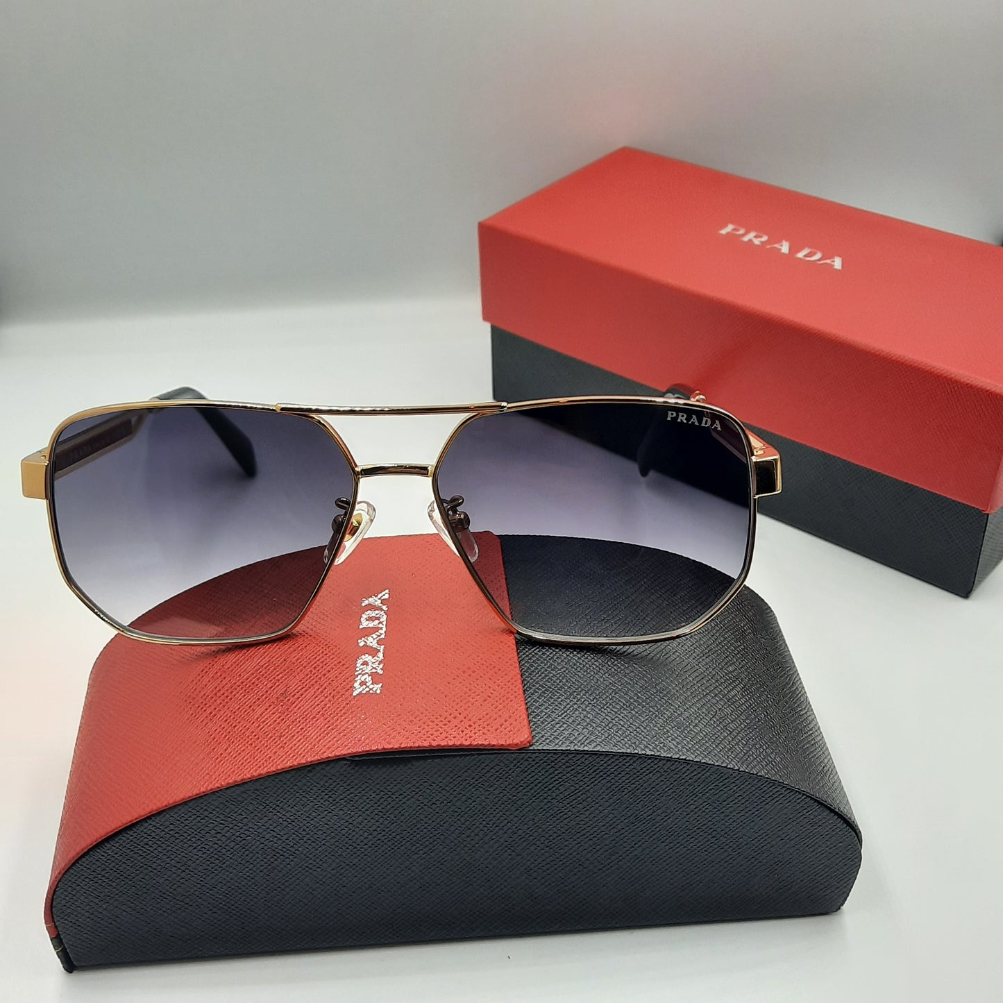 Solaires: PRADA OPS51ZS rouge doré noir