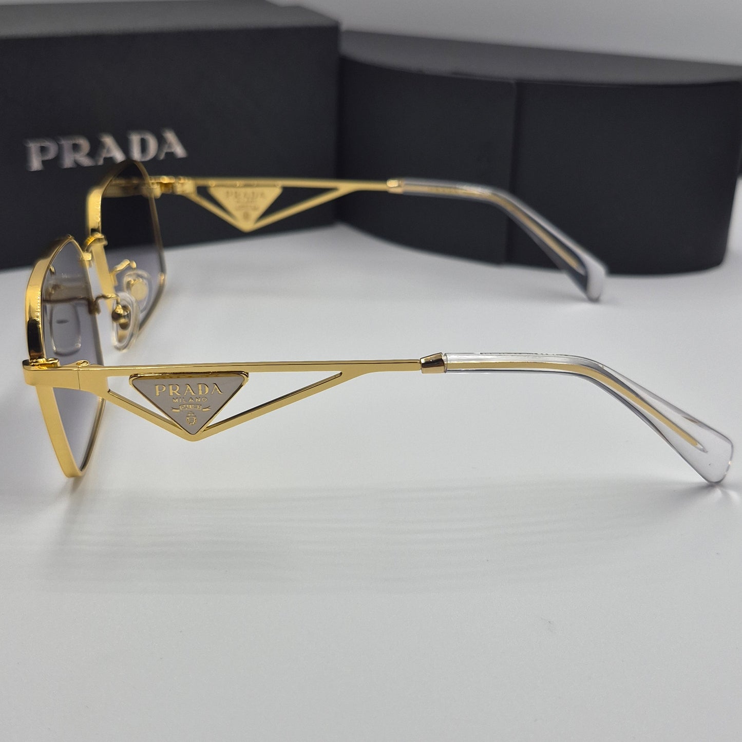 Solaires: PRADA PRA51V doré noir deg