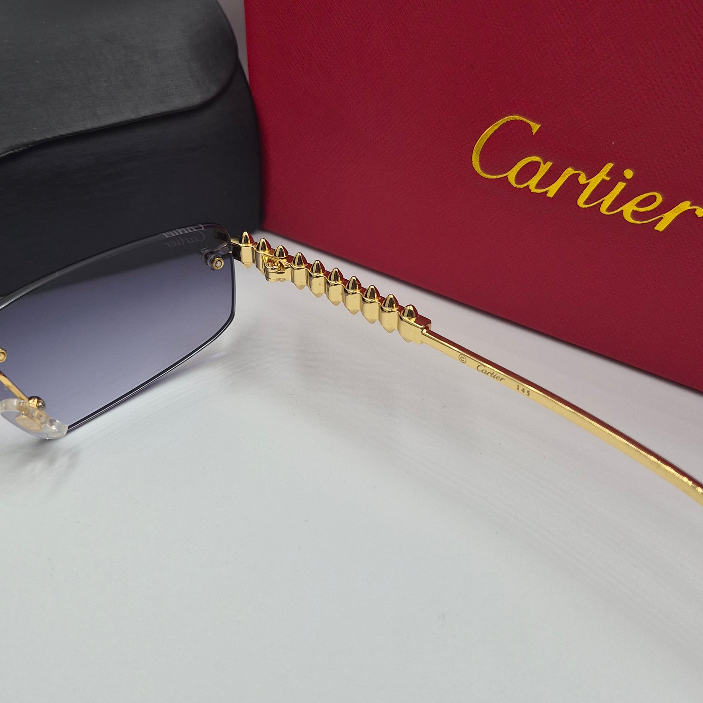 Solaires: CARTIER CLASH CT0544S doré noir deg