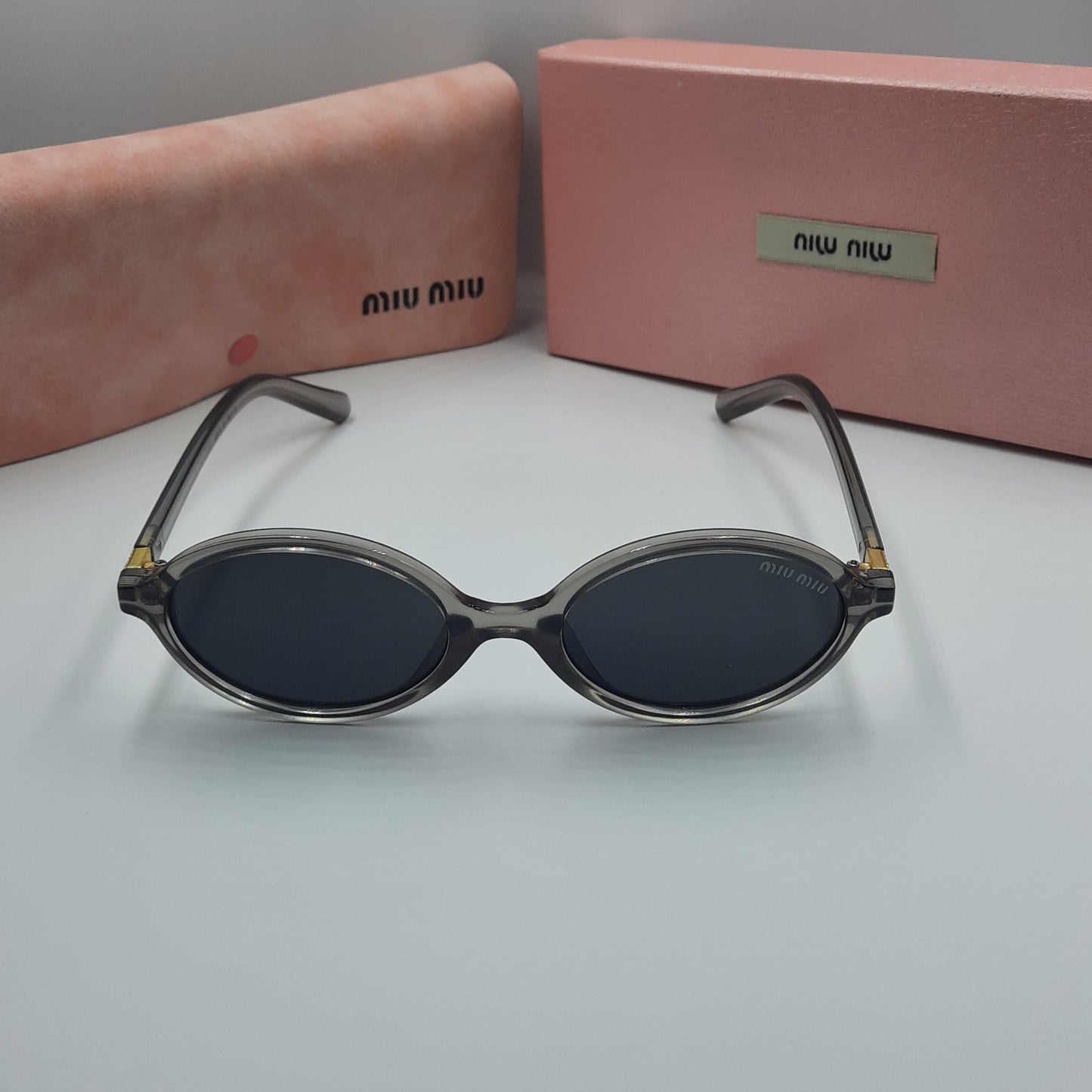 Solaires: MIUMIU doré gris