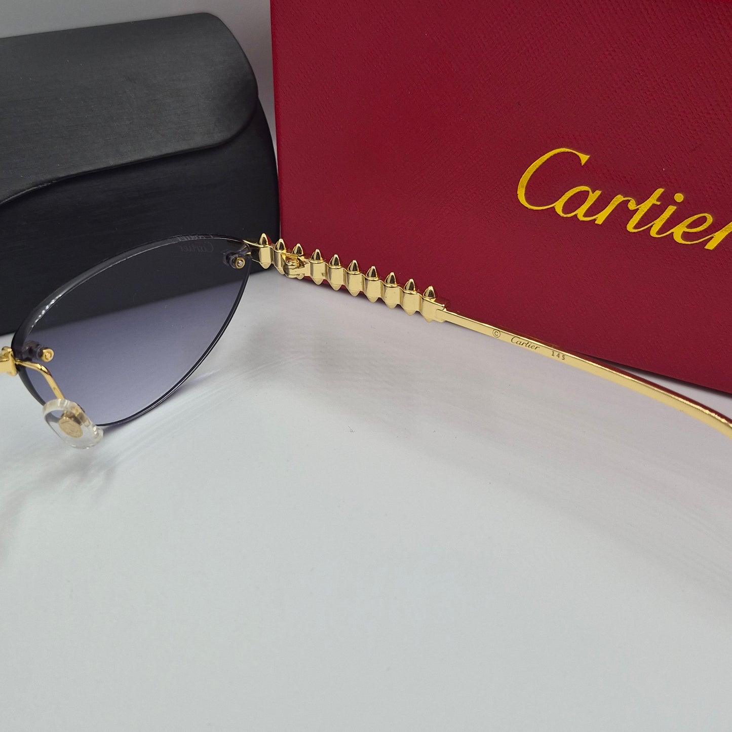 Solaires: CARTIER CLASH CT0543S doré noir deg