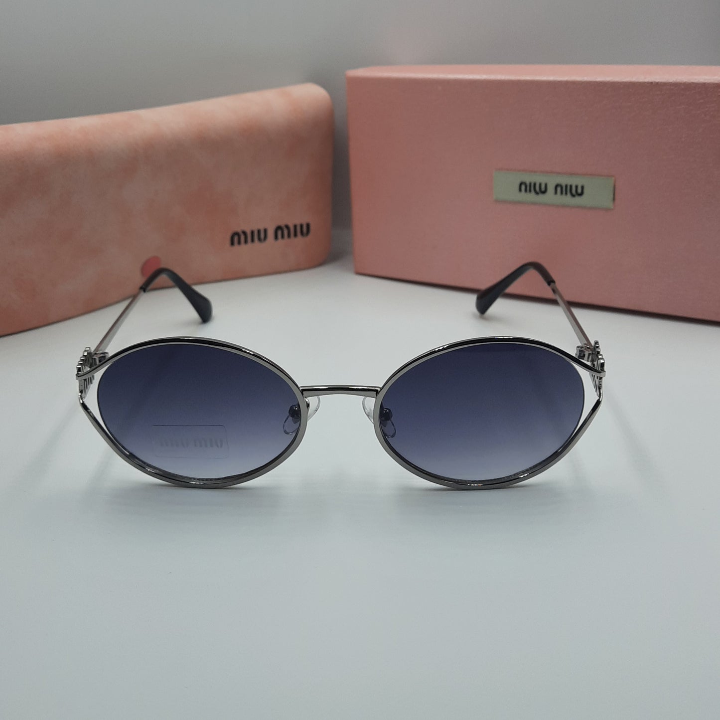 Solaires: MIUMIU argenté