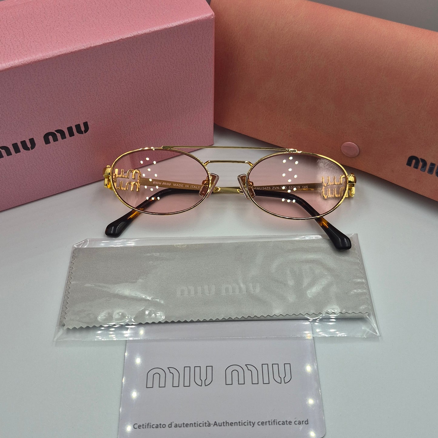 Solaires: MIUMIU SMU54ZS doré rose saumon