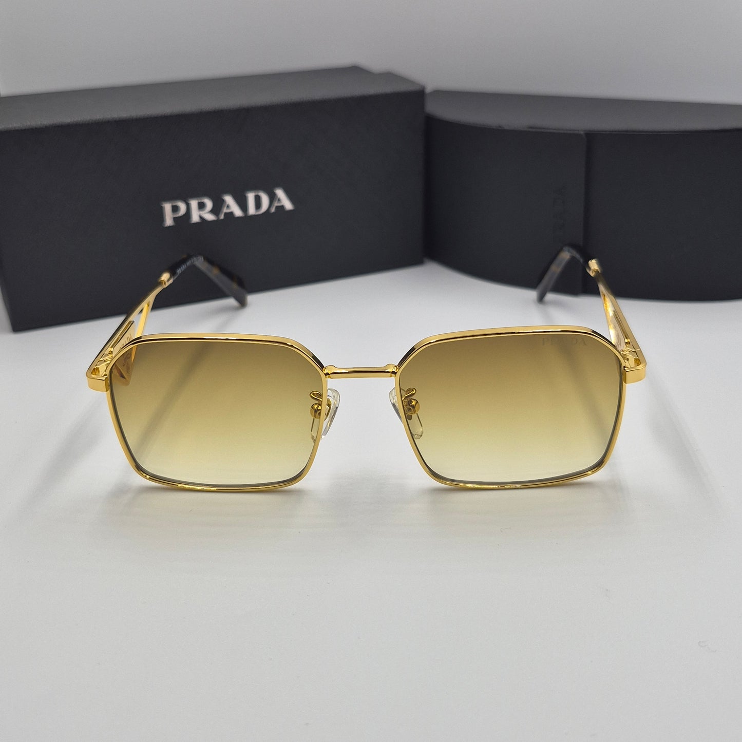 Solaires: PRADA PRA51V doré marron deg