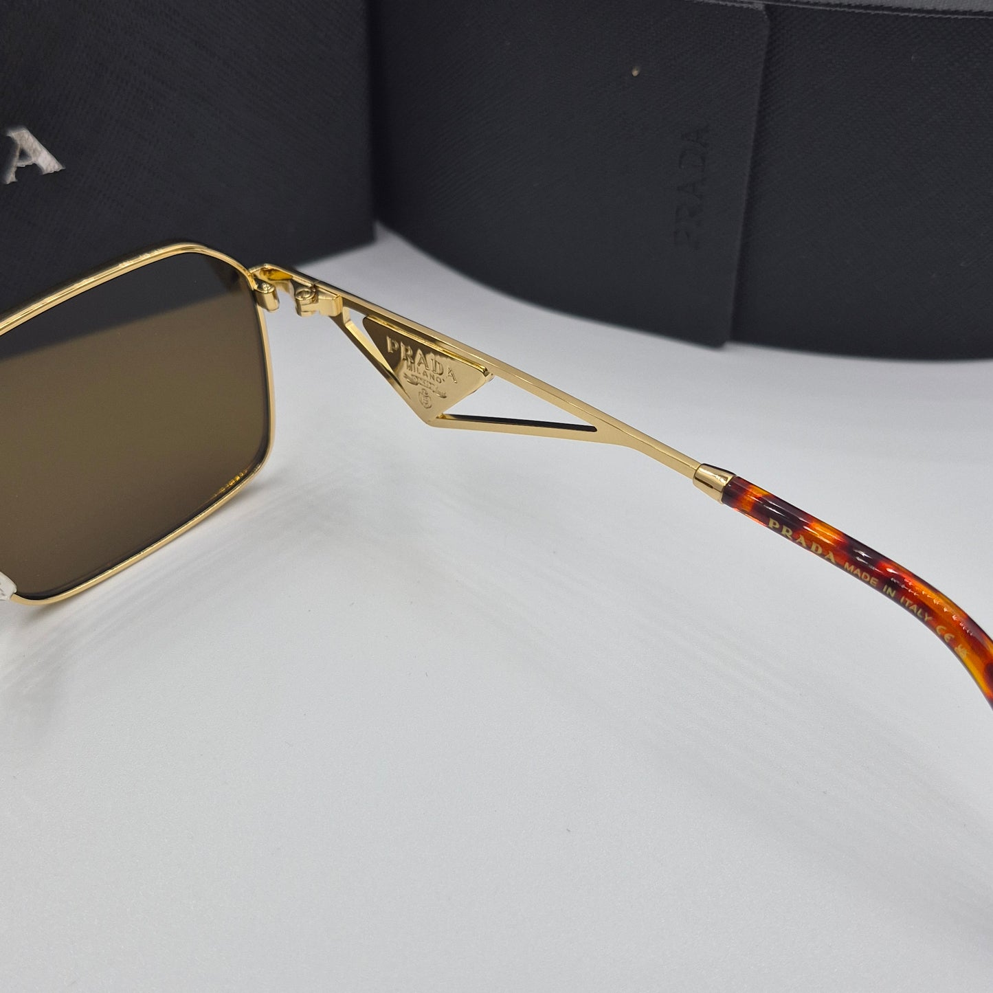 Solaires: PRADA PRA51V doré marron havane