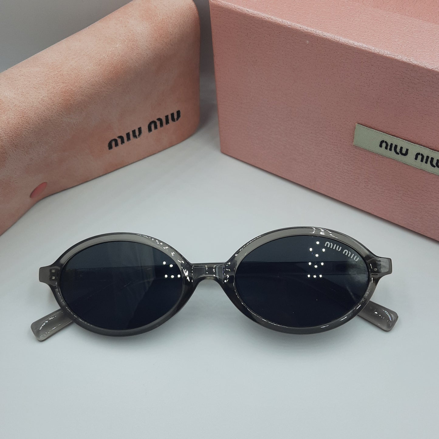 Solaires: MIUMIU doré gris