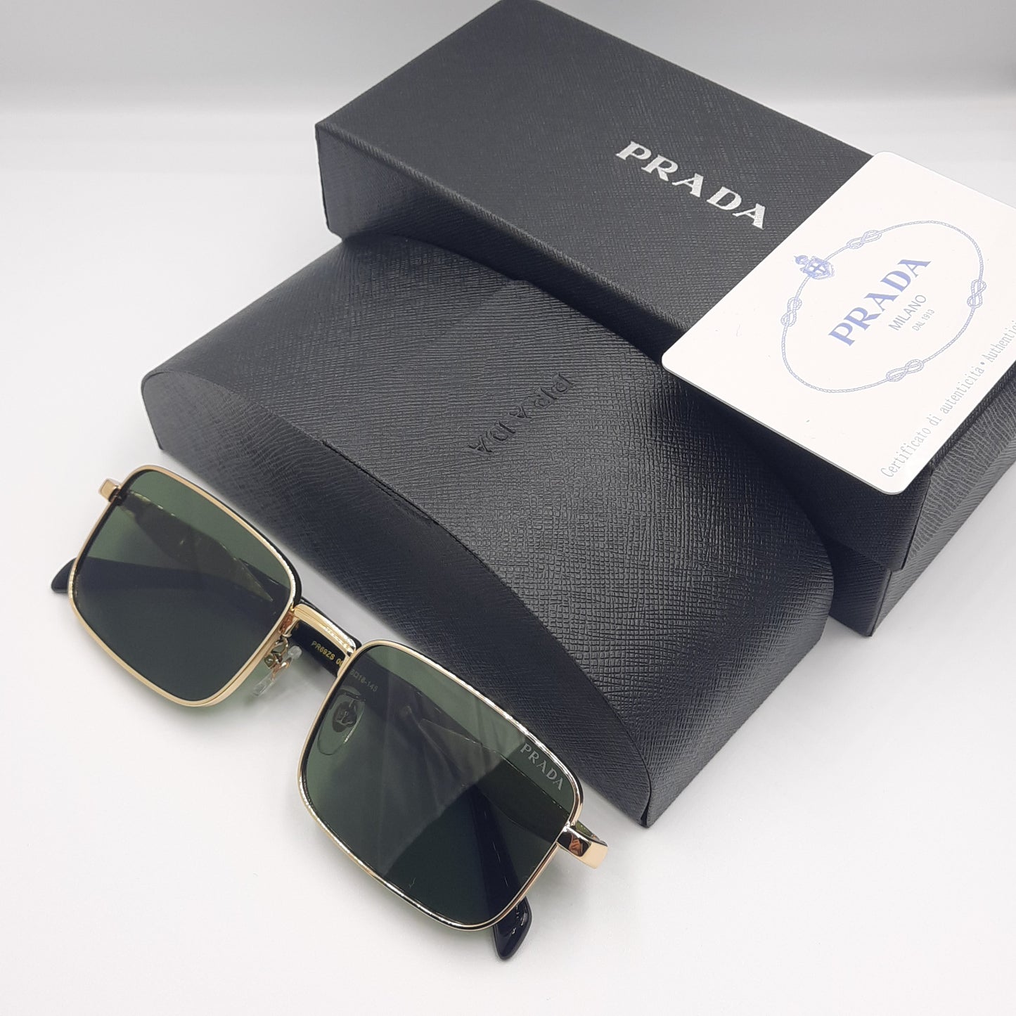 Solaires: PRADA PR69ZS doré noir vert