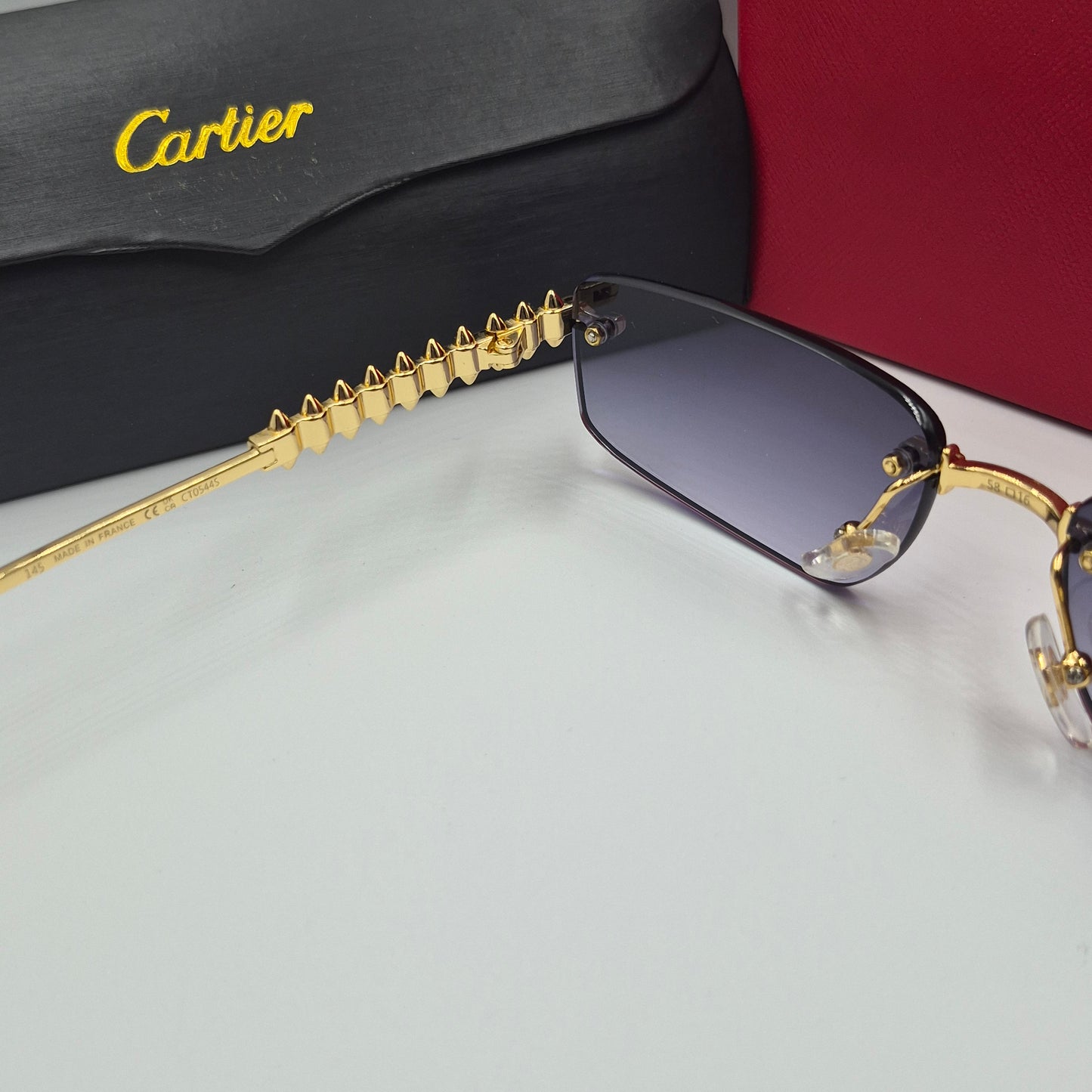 Solaires: CARTIER CLASH CT0544S doré noir deg
