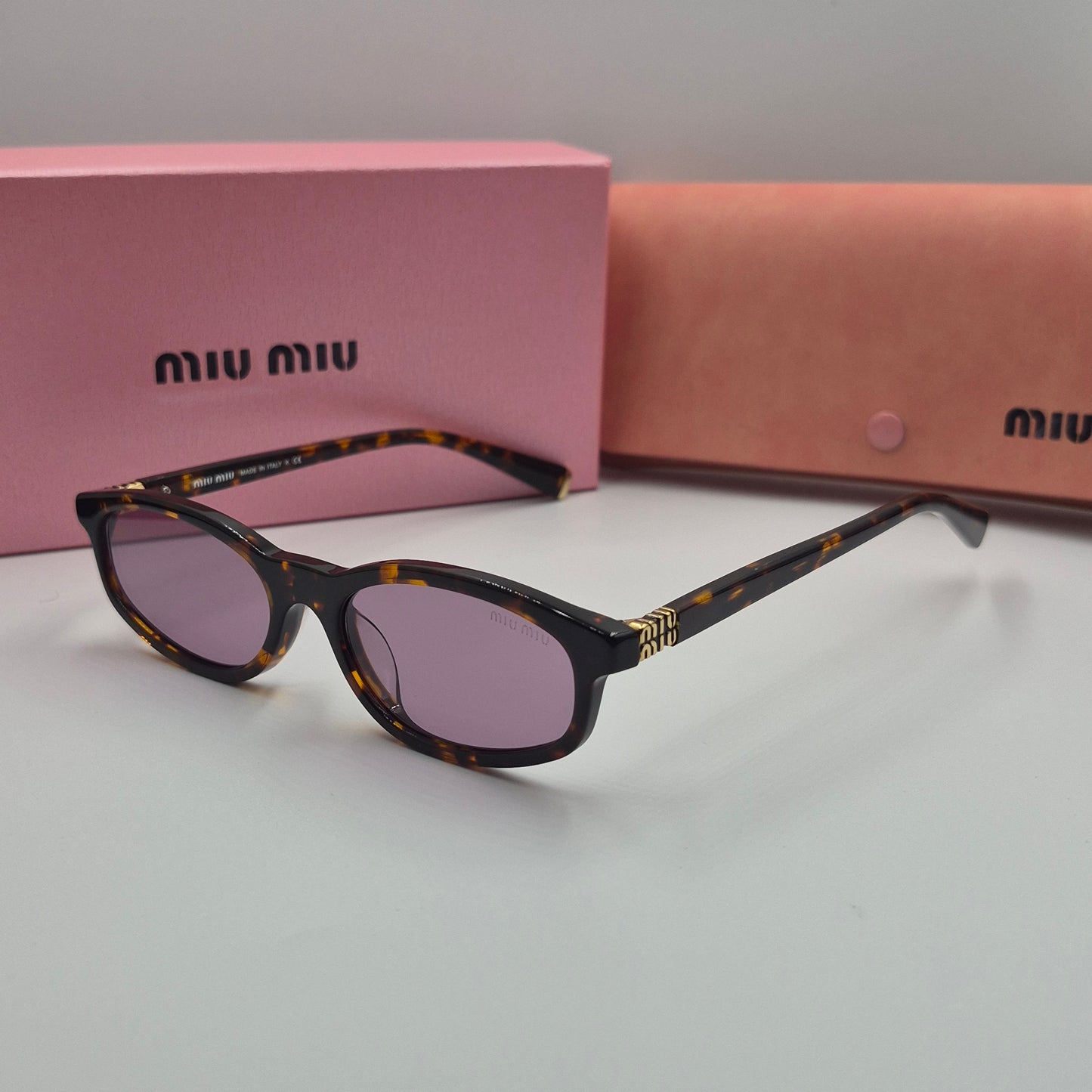 Solaires: MIUMIU SMU06S violet havane