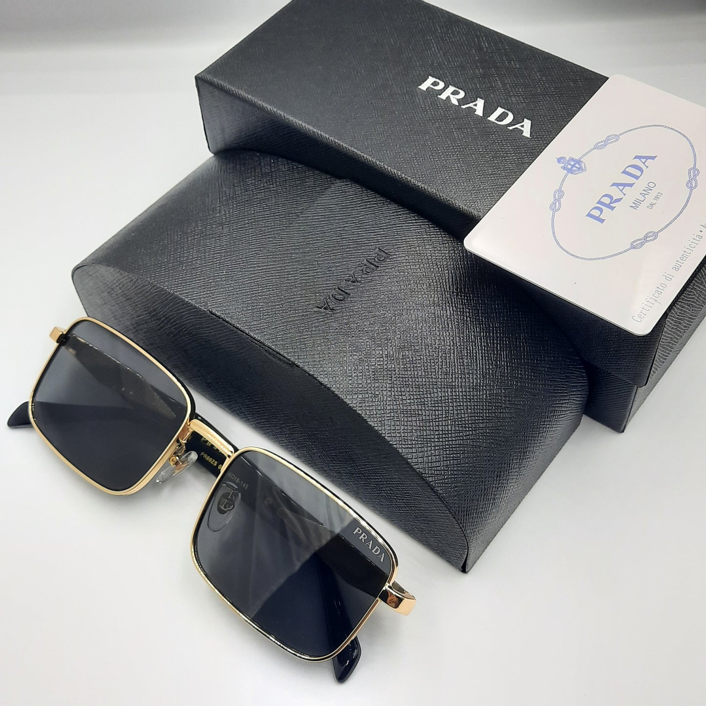 Solaires: PRADA PR69ZS doré noir
