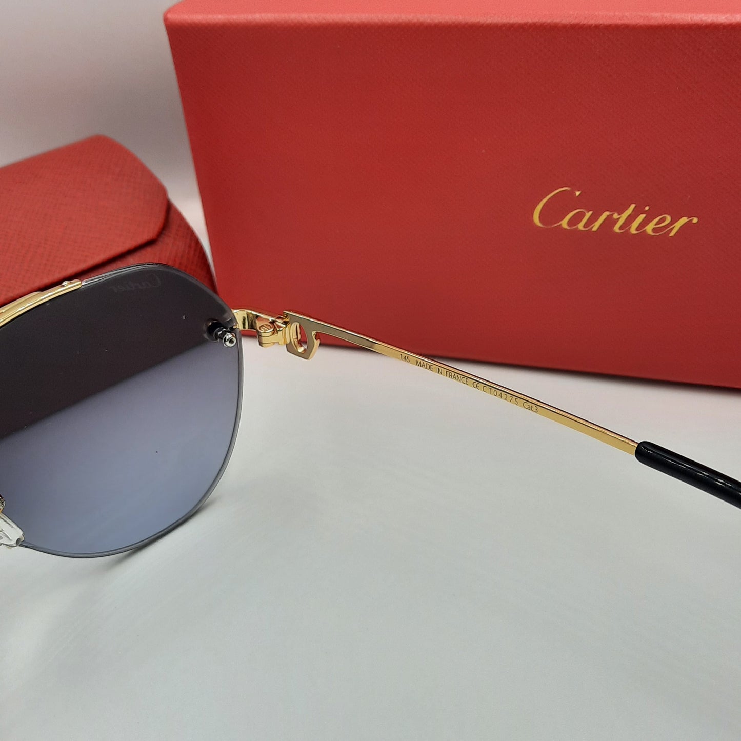 Solaires: CARTIER semi percé CT0427S doré noir