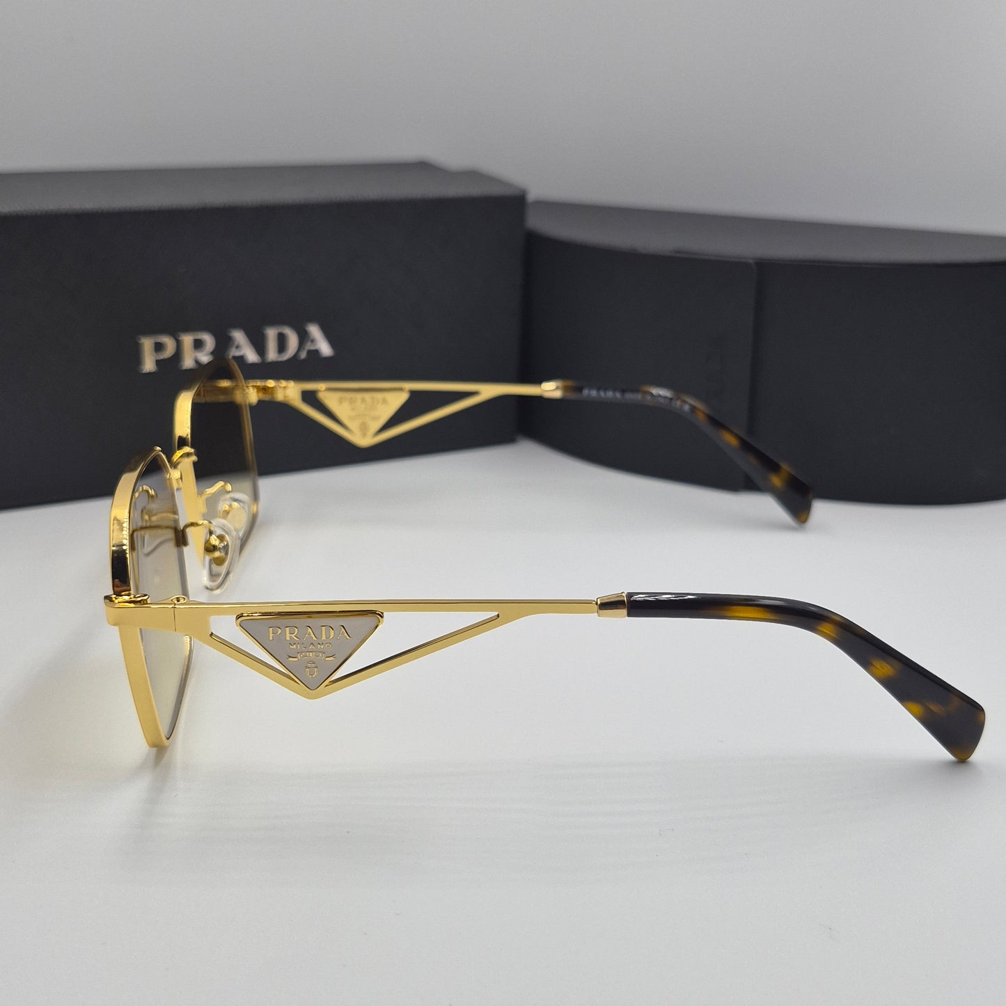 Solaires: PRADA PRA51V doré marron deg