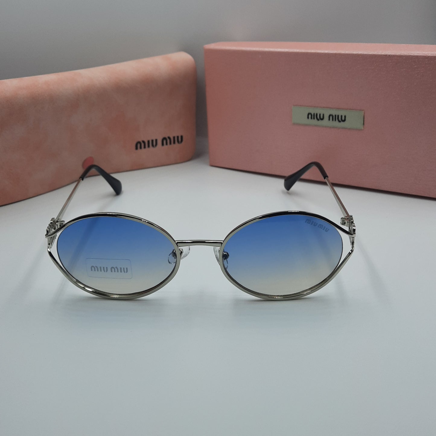 Solaires: MIUMIU argenté bleu