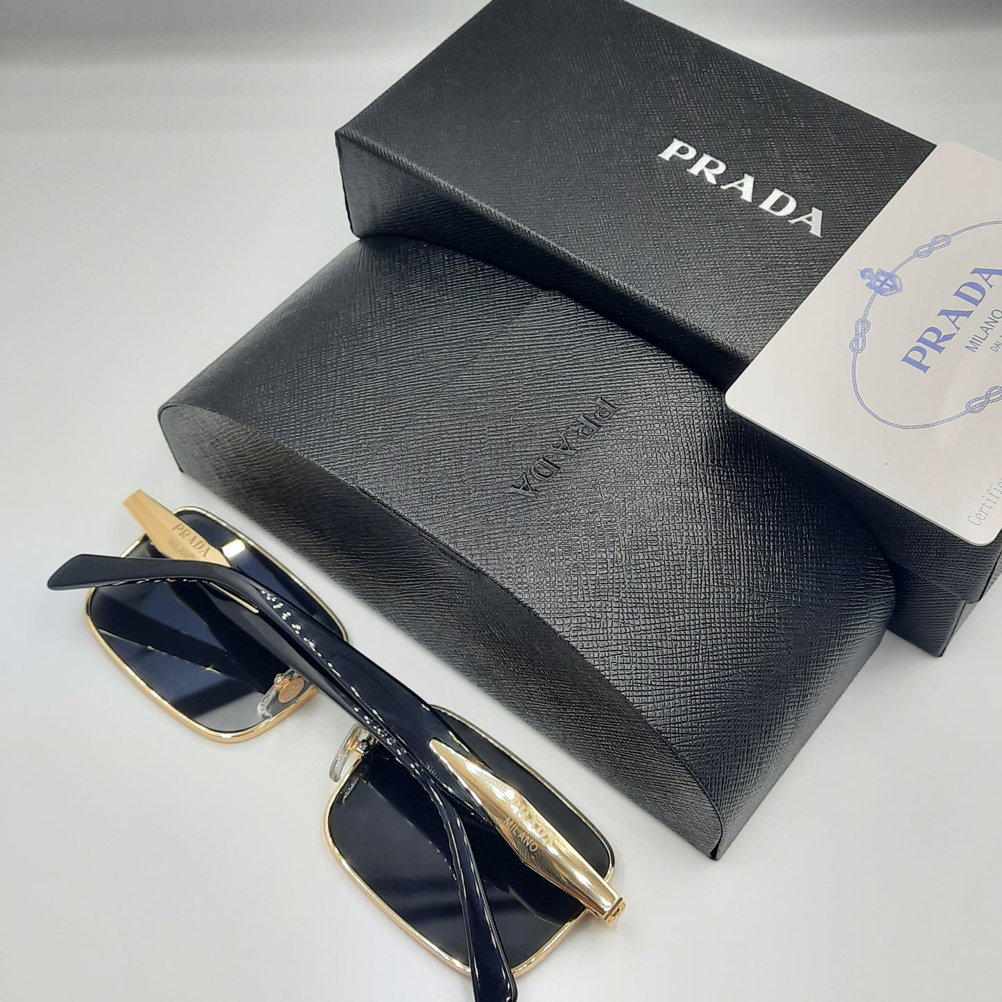 Solaires: PRADA PR69ZS doré noir