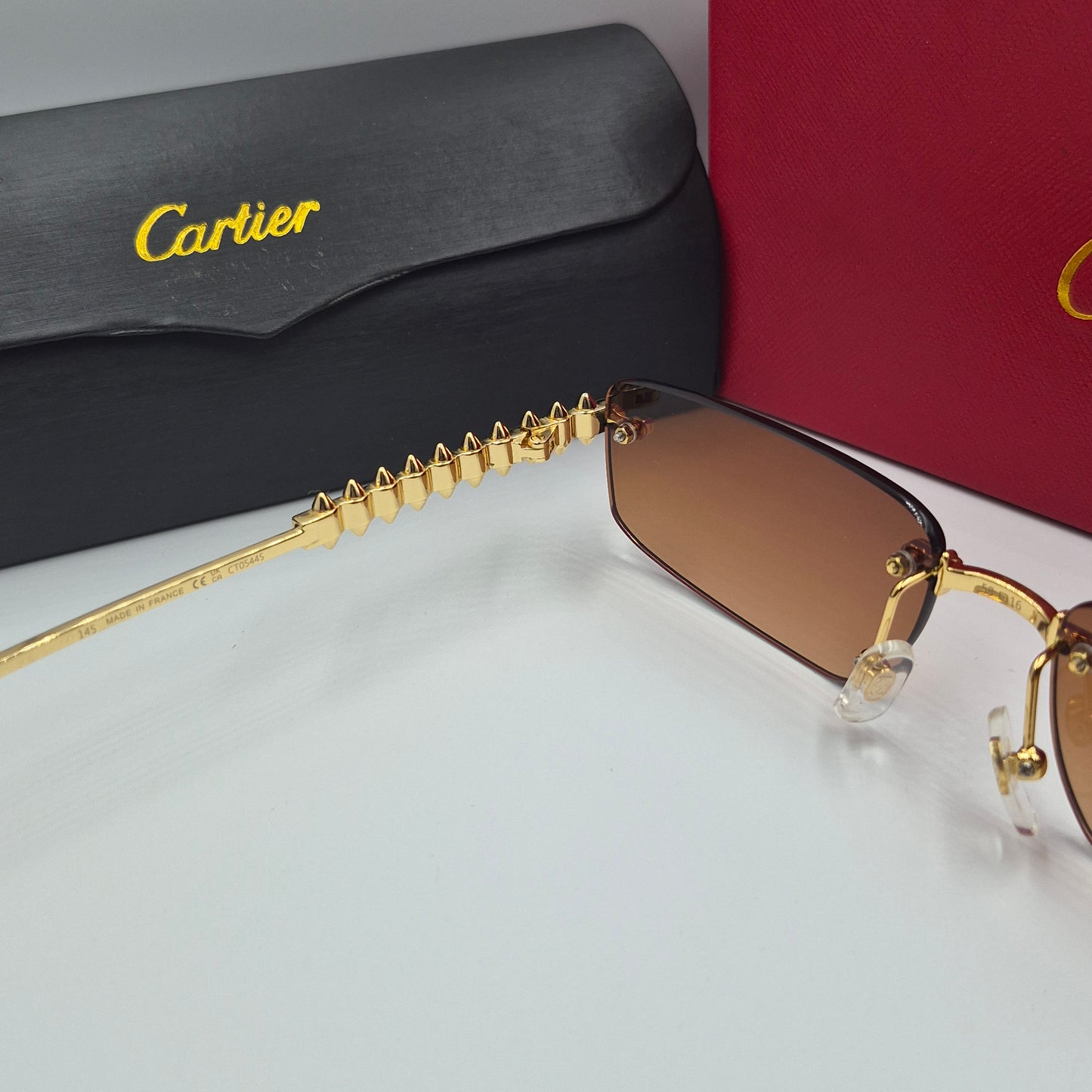 Solaires: CARTIER CLASH CT0544S doré marron