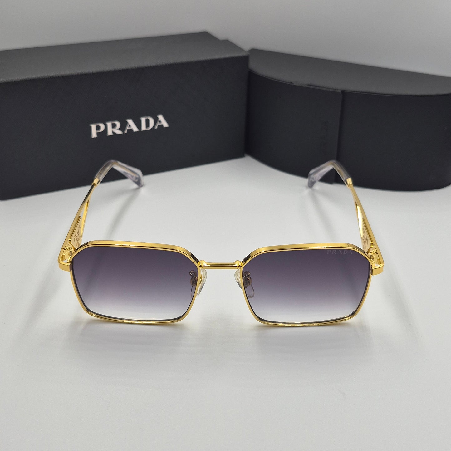 Solaires: PRADA PRA51V doré noir deg