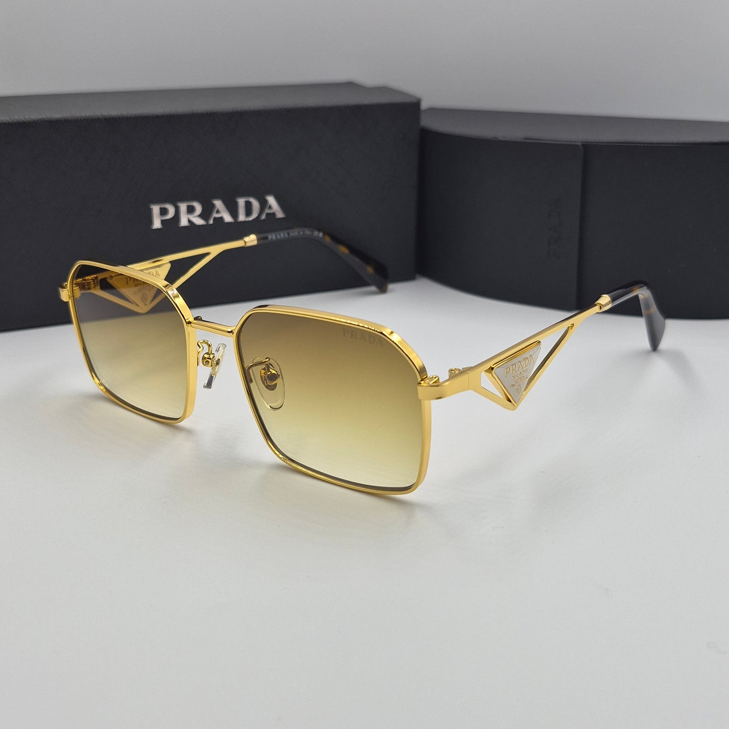 Solaires: PRADA PRA51V doré marron deg