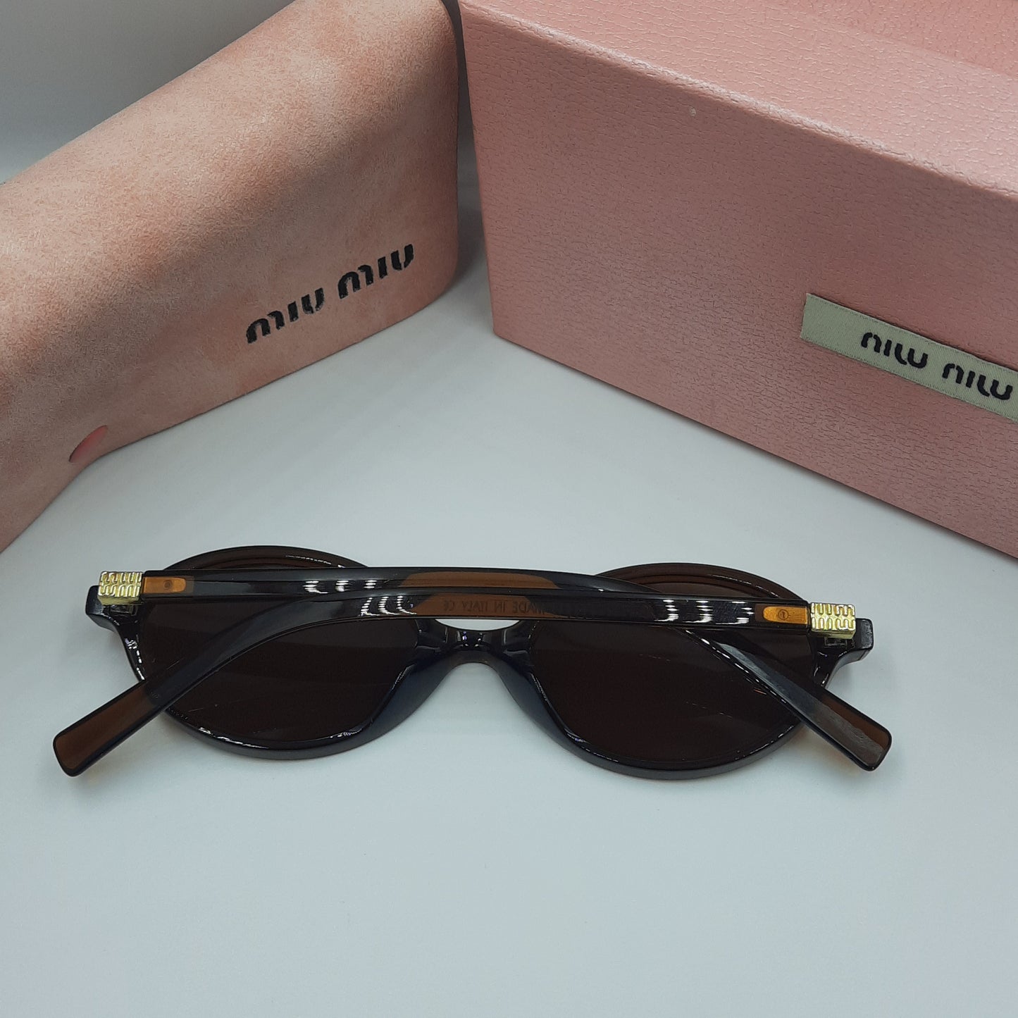 Solaires: MIUMIU doré marron