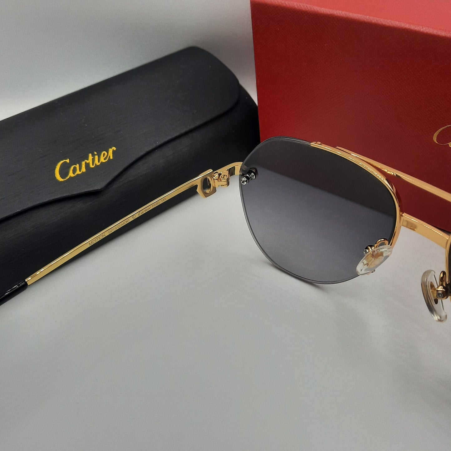 Solaires: CARTIER semi percé CT0427S doré noir
