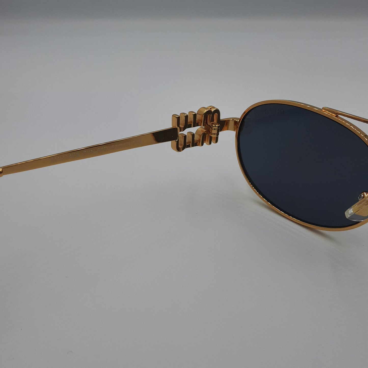 Solaires: MIUMIU SMU54ZS Noir/GOLD
