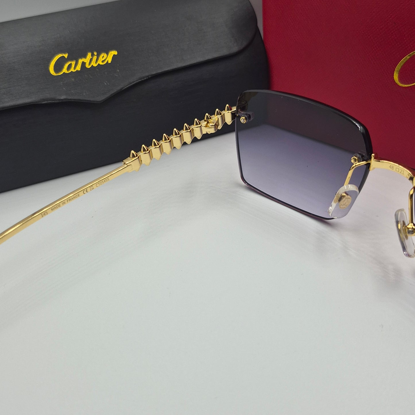 Solaires: CARTIER CLASH CT0545S doré noir neg