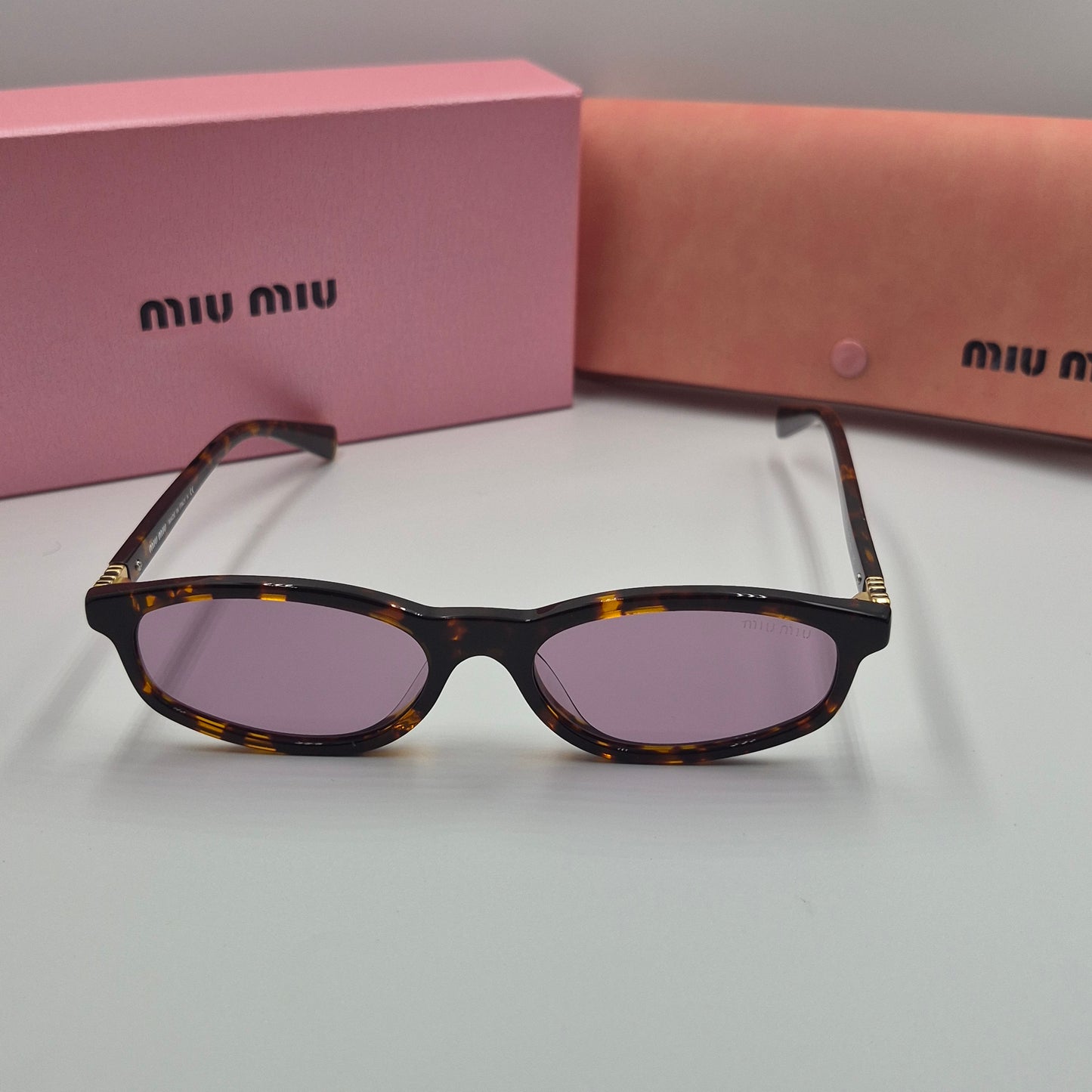 Solaires: MIUMIU SMU06S violet havane