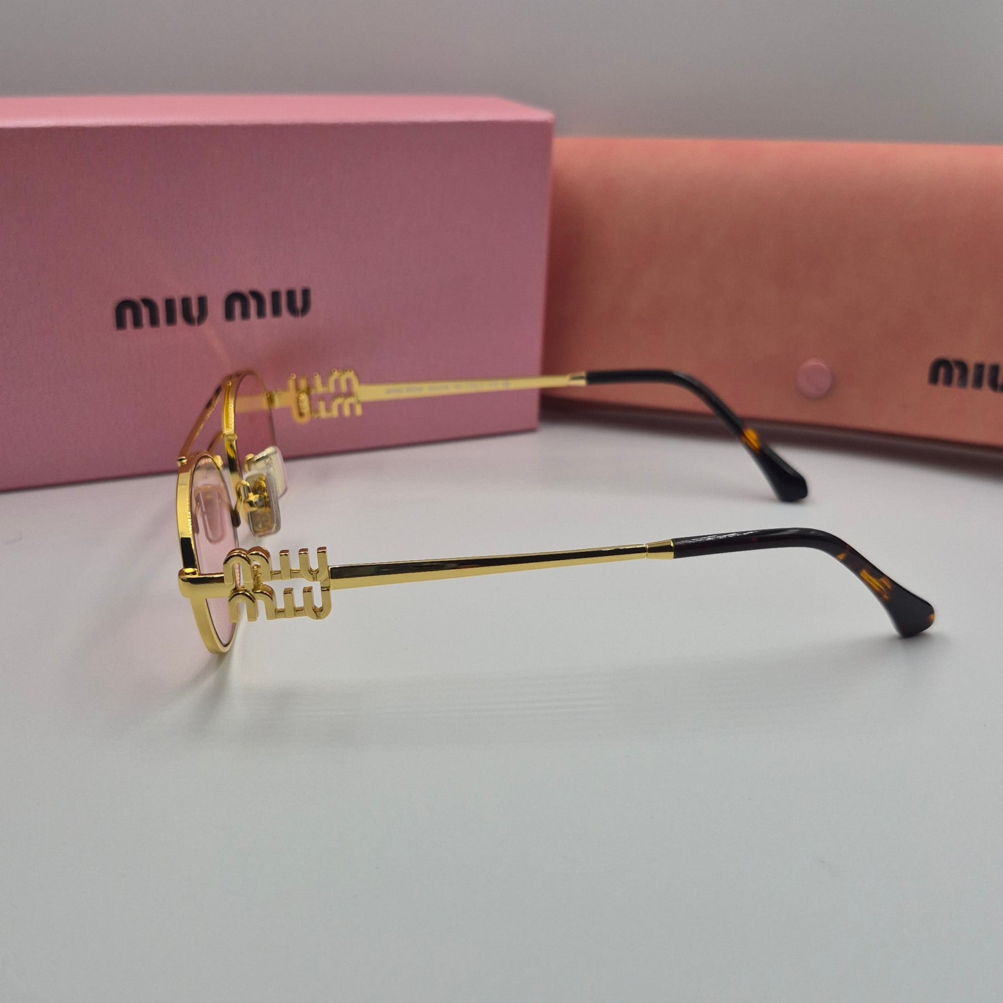 Solaires: MIUMIU SMU54ZS doré rose saumon