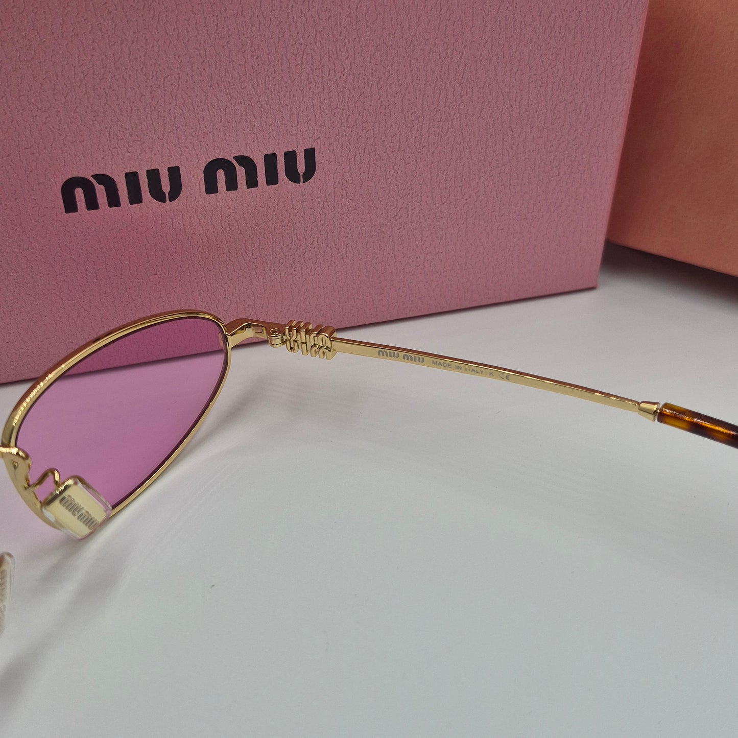 Solaires: MIUMIU SMU52S doré rose