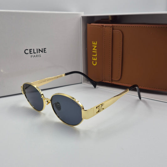 Solaires: CELINE Triomphe doré noir avec pochette à bandoulière