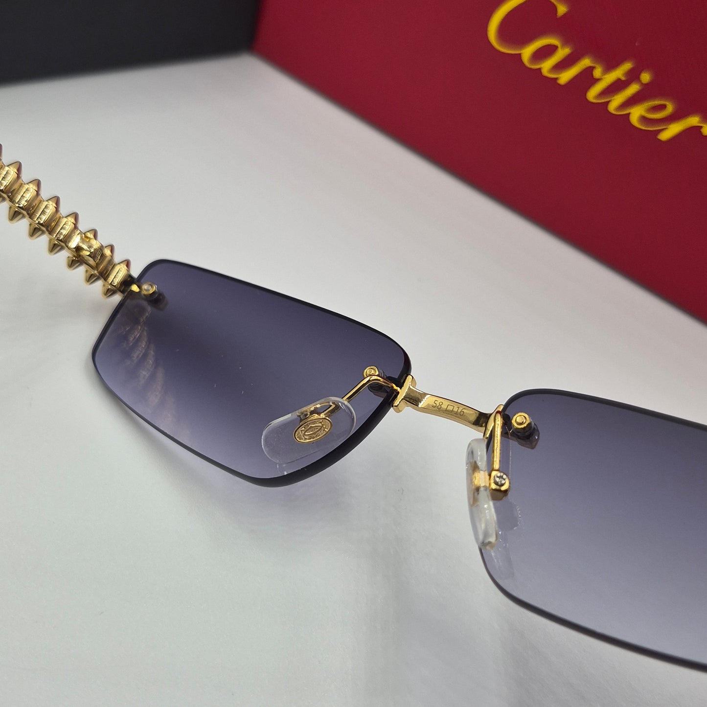 Solaires: CARTIER CLASH CT0544S doré noir deg