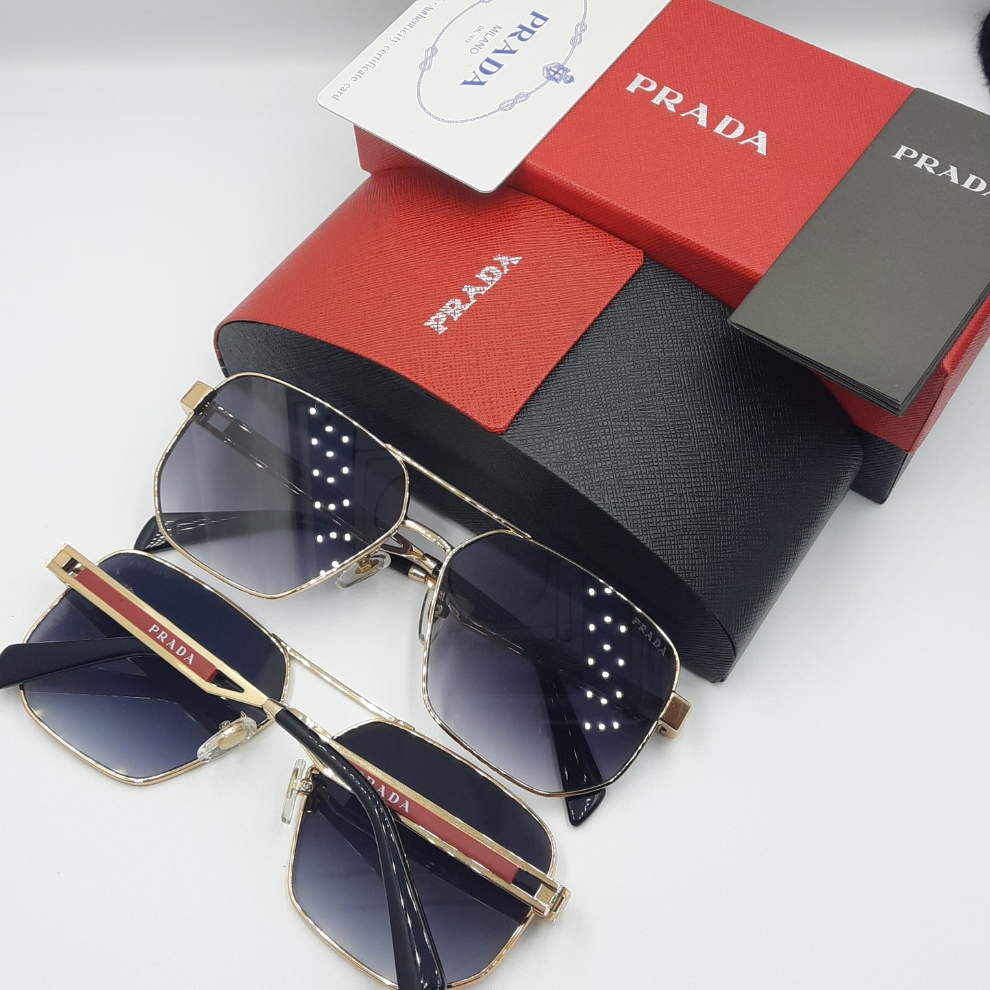 Solaires: PRADA OPS51ZS rouge doré noir