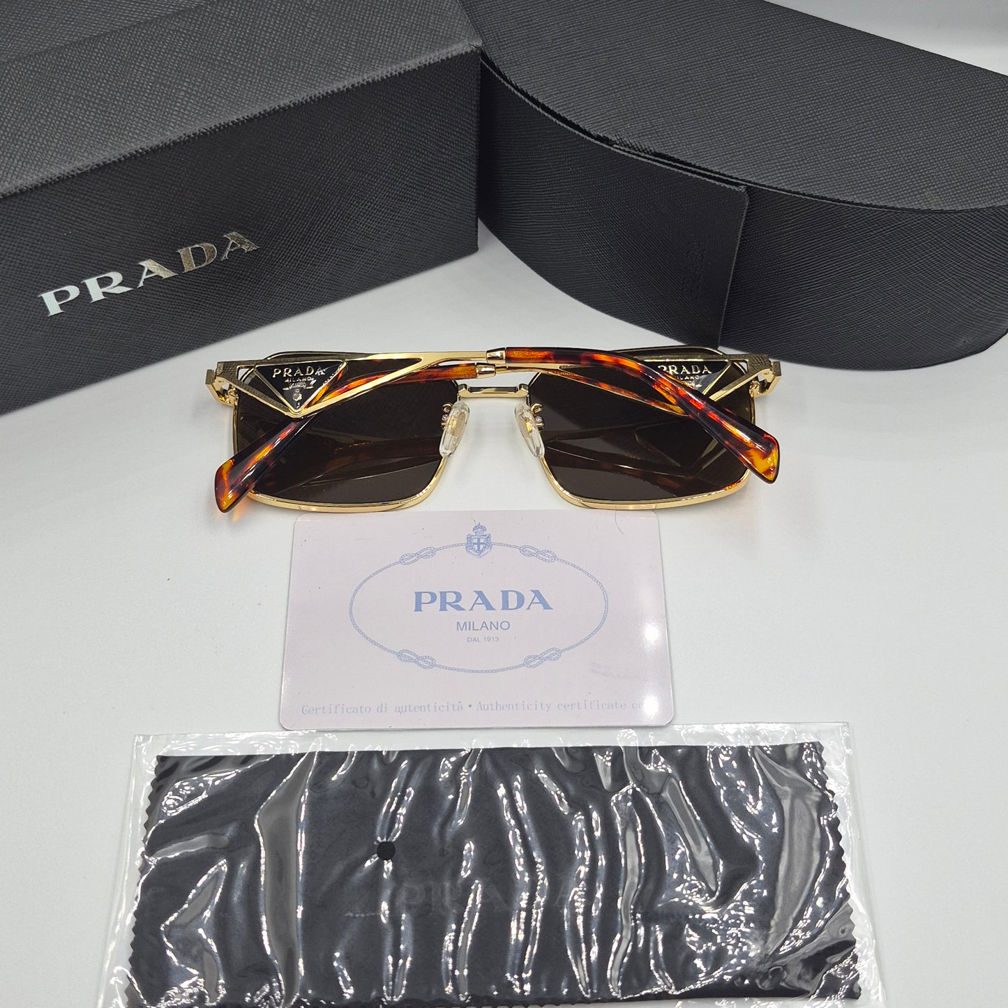 Solaires: PRADA PRA51V doré marron havane