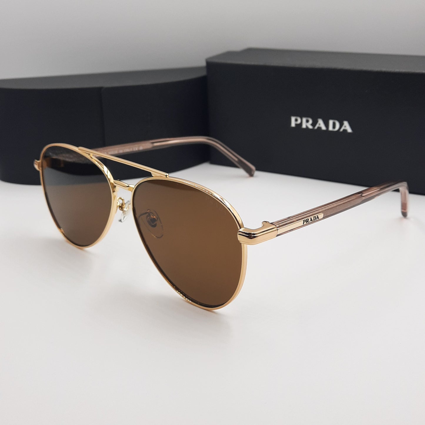 Solaires: PRADA SPRA58 rose gold