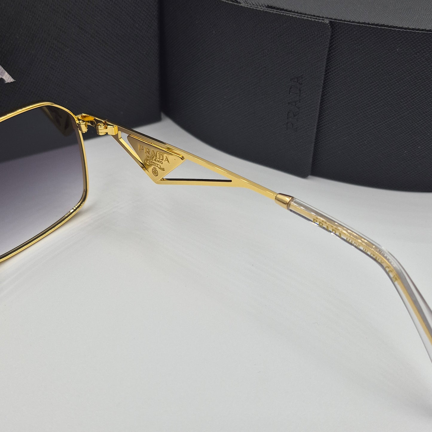 Solaires: PRADA PRA51V doré noir deg