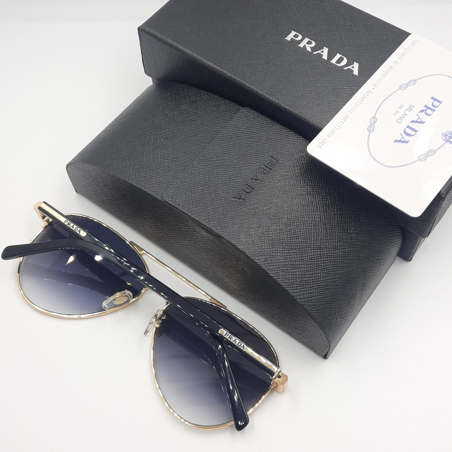 Solaires: PRADA SPRA58 doré noir deg