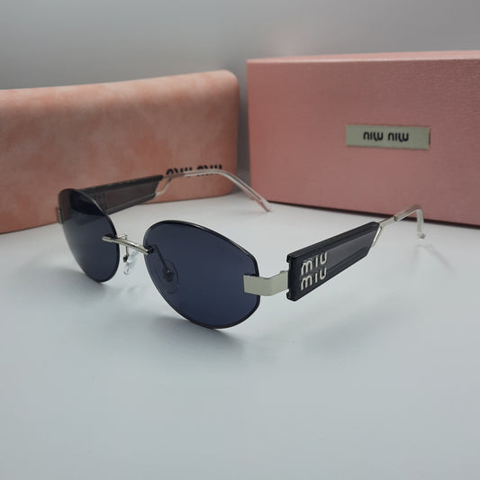 Solaires: MIUMIU argent noir