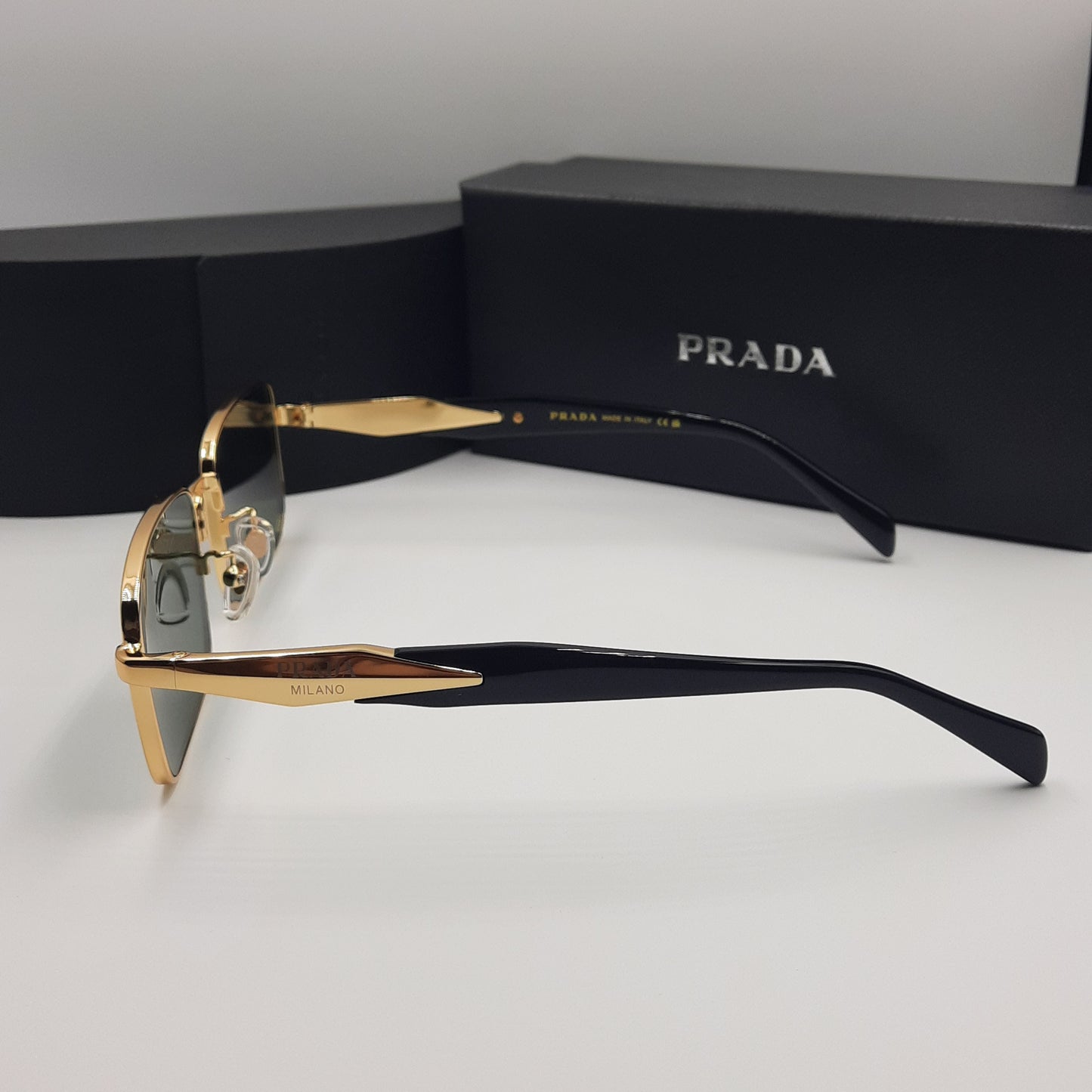 Solaires: PRADA PR69ZS doré noir vert